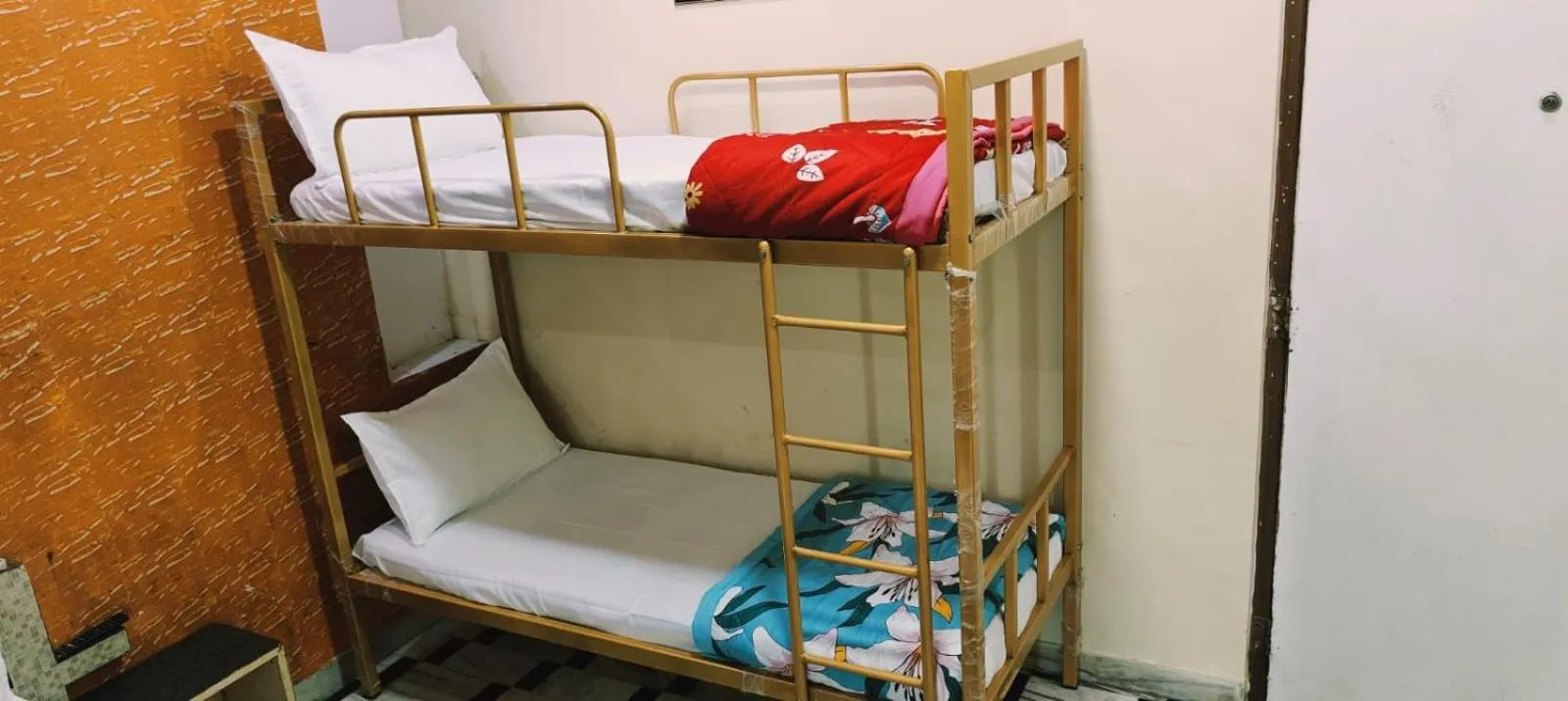 Bed in HOTEL HAYAT RESIDENCY