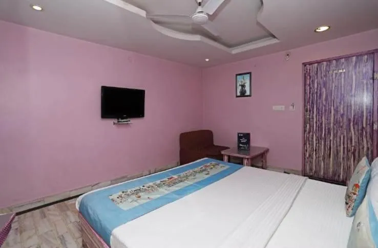Bed in HOTEL HAYAT RESIDENCY