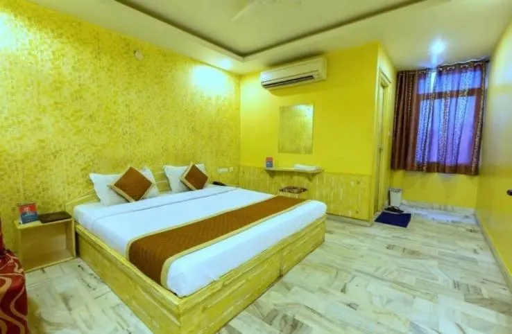 Bed in HOTEL HAYAT RESIDENCY