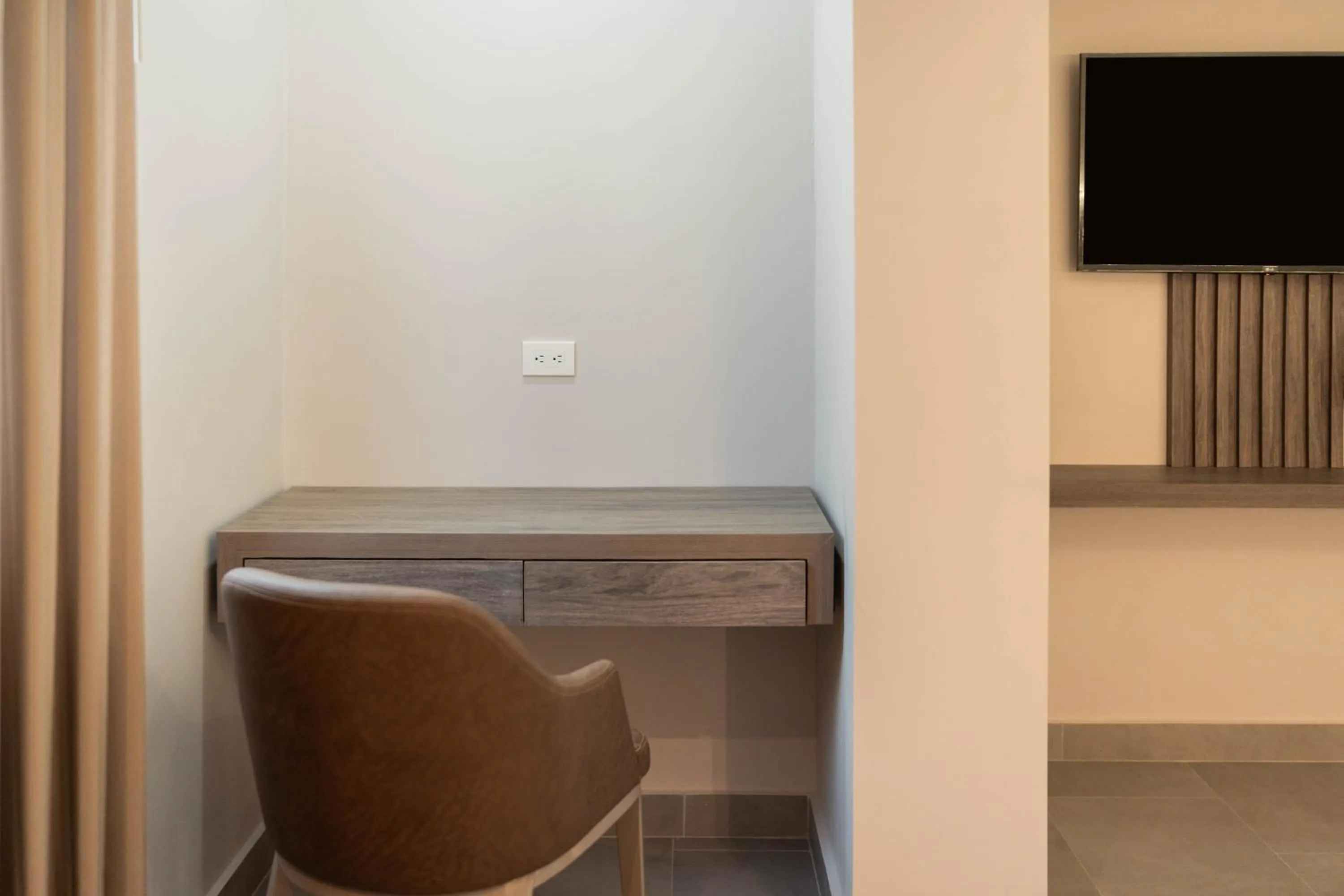 TV and multimedia in Amari Living Suites