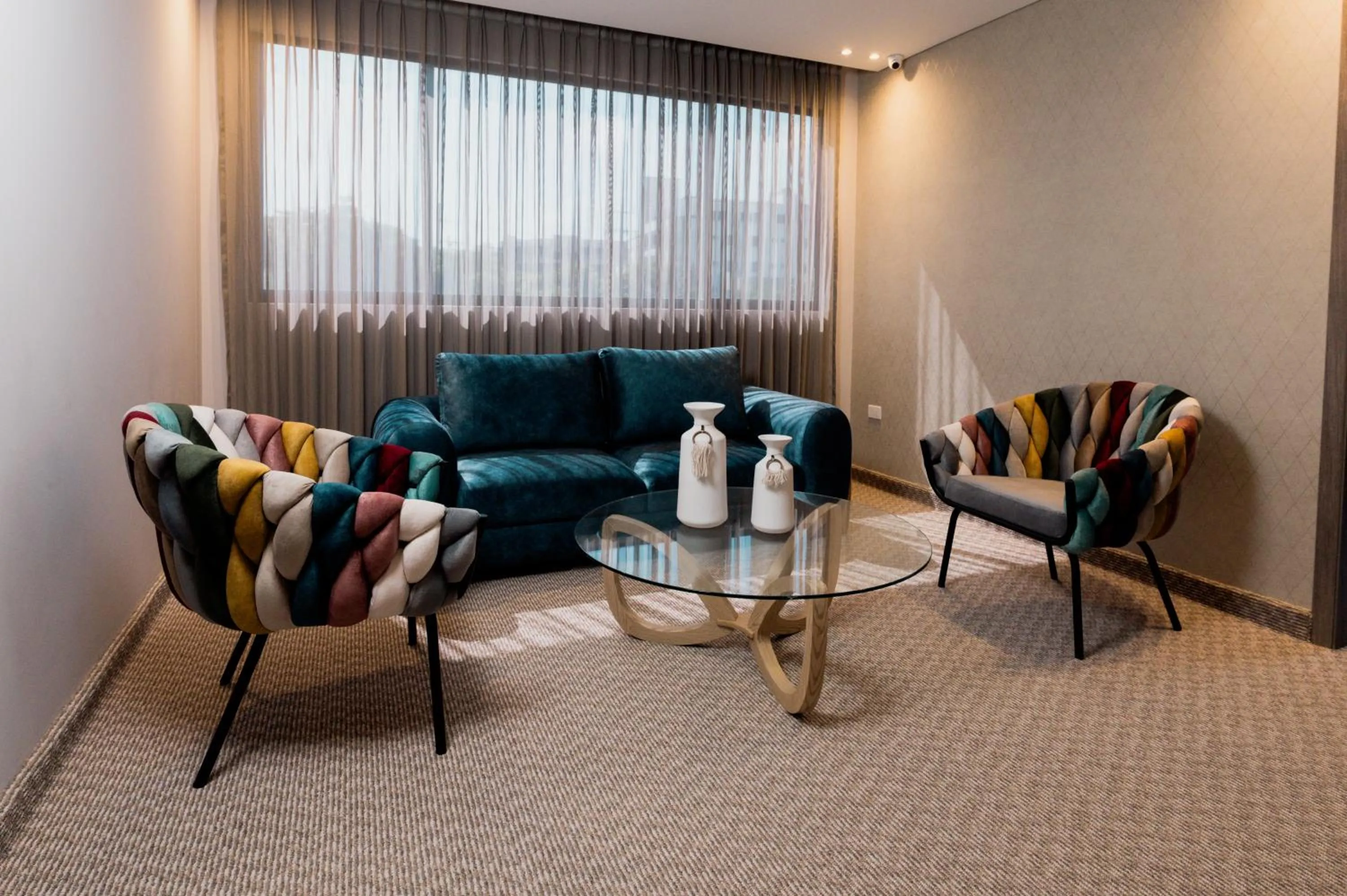 Communal lounge/ TV room in Amari Living Suites