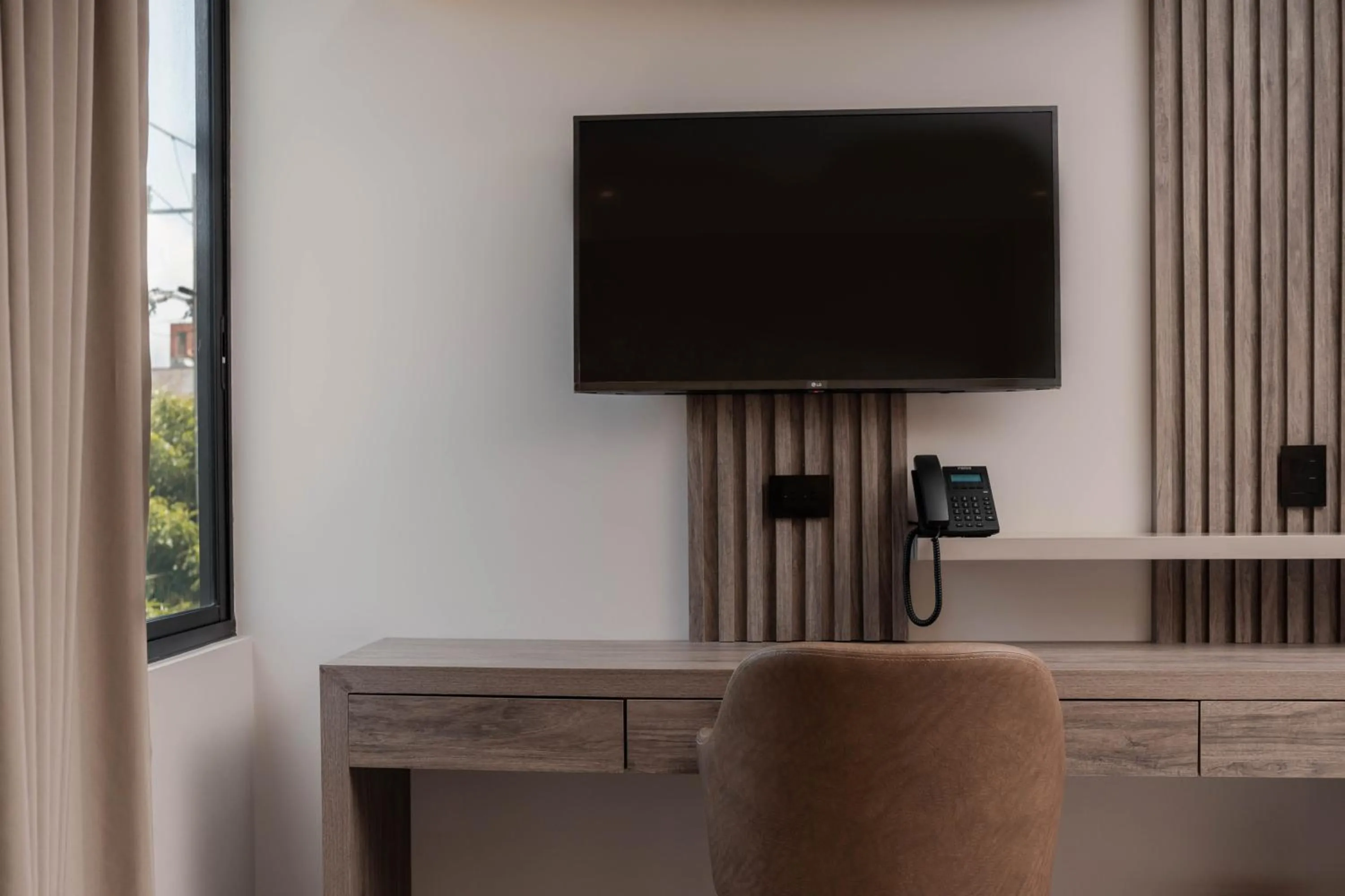 TV and multimedia in Amari Living Suites