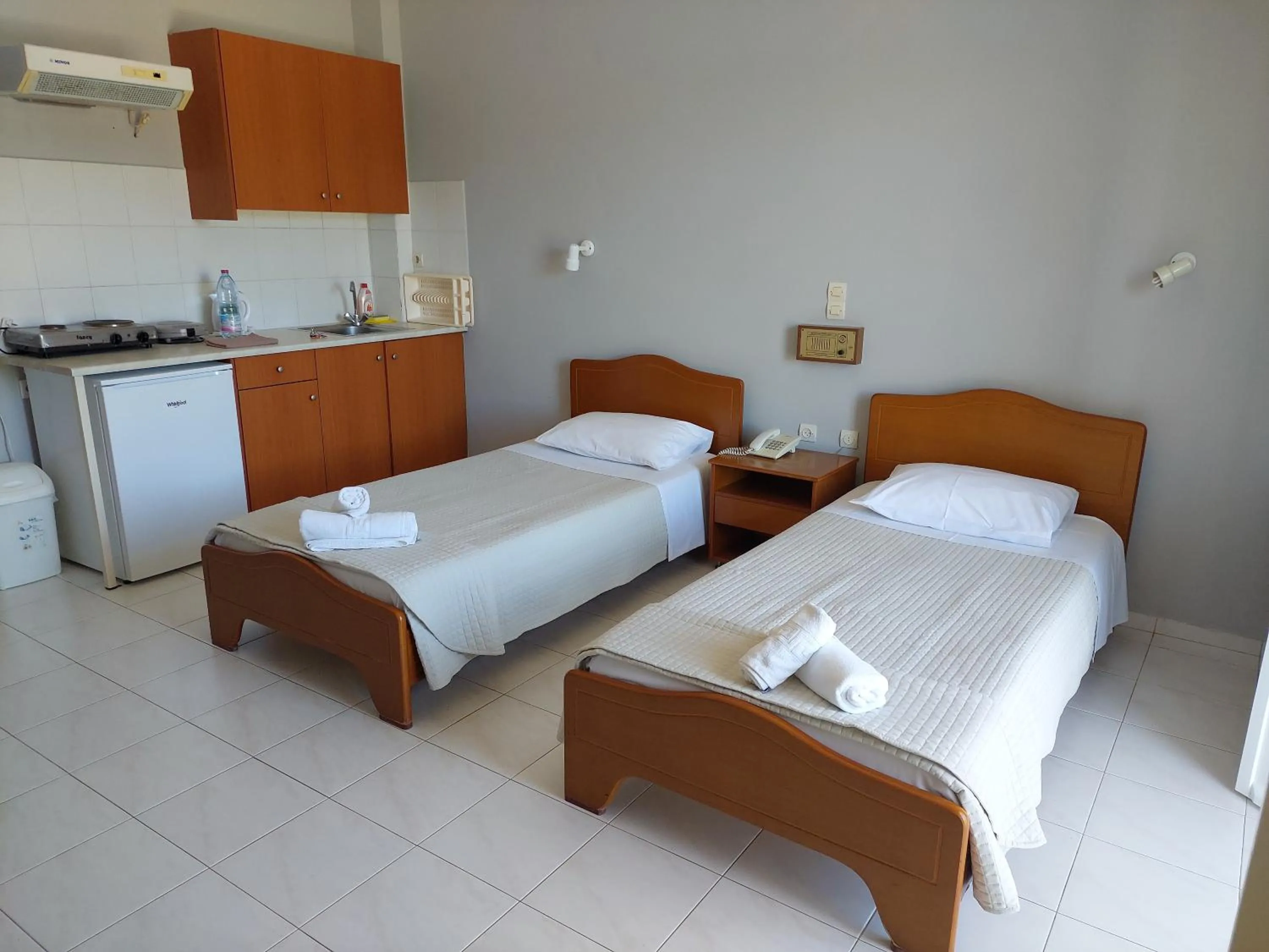 Bed in Ammousa Hotel Apartments