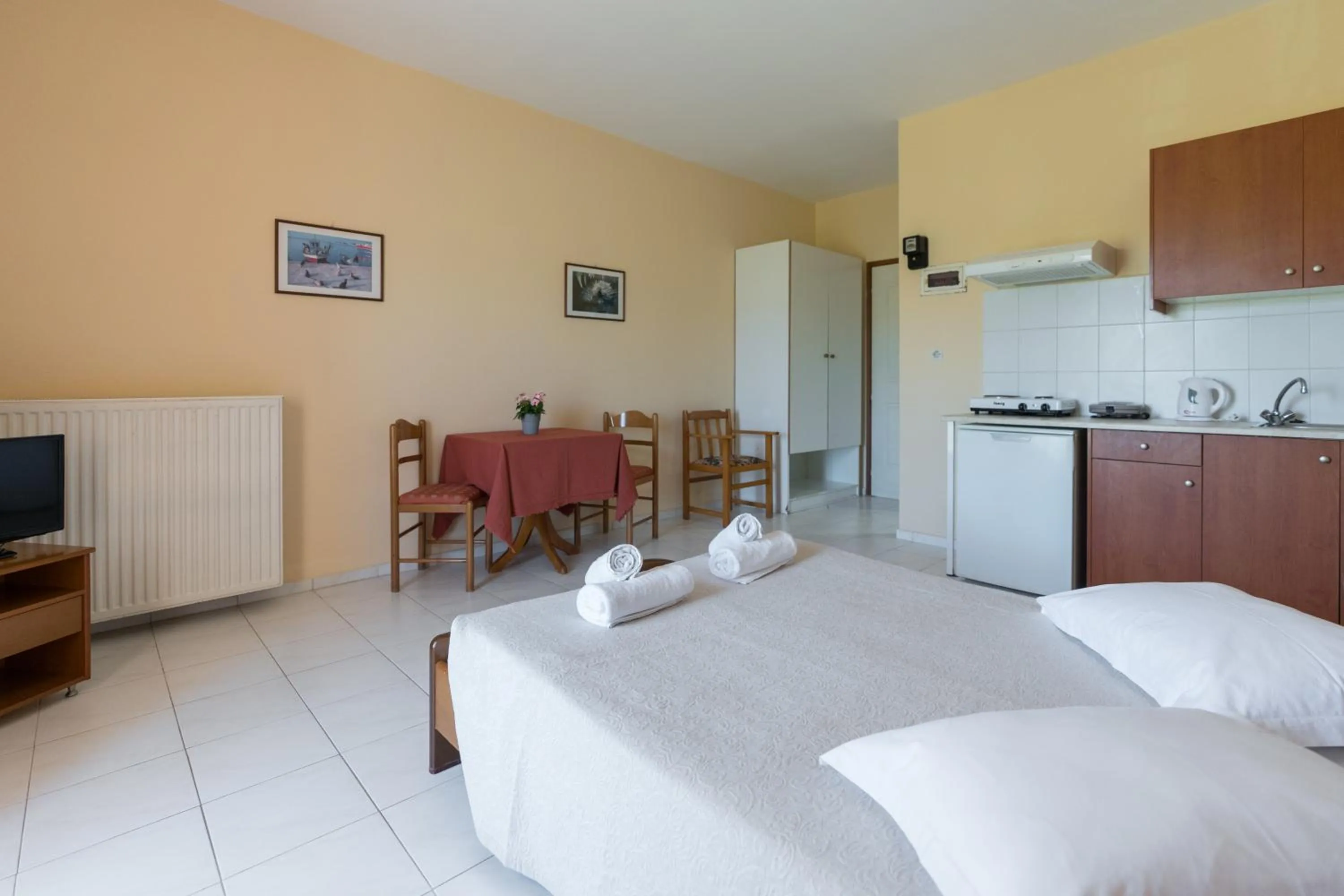 Bed in Ammousa Hotel Apartments