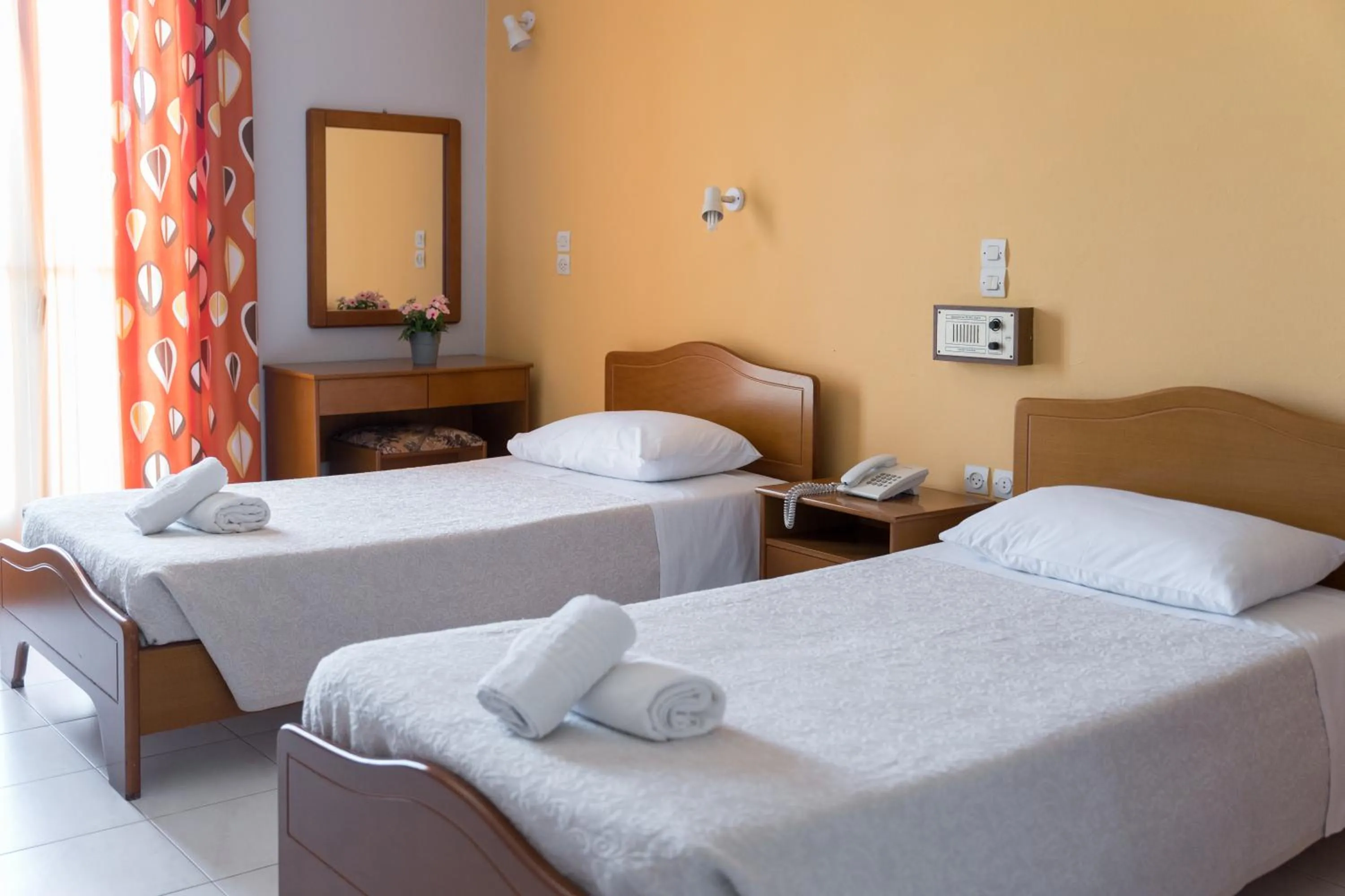 Bed in Ammousa Hotel Apartments