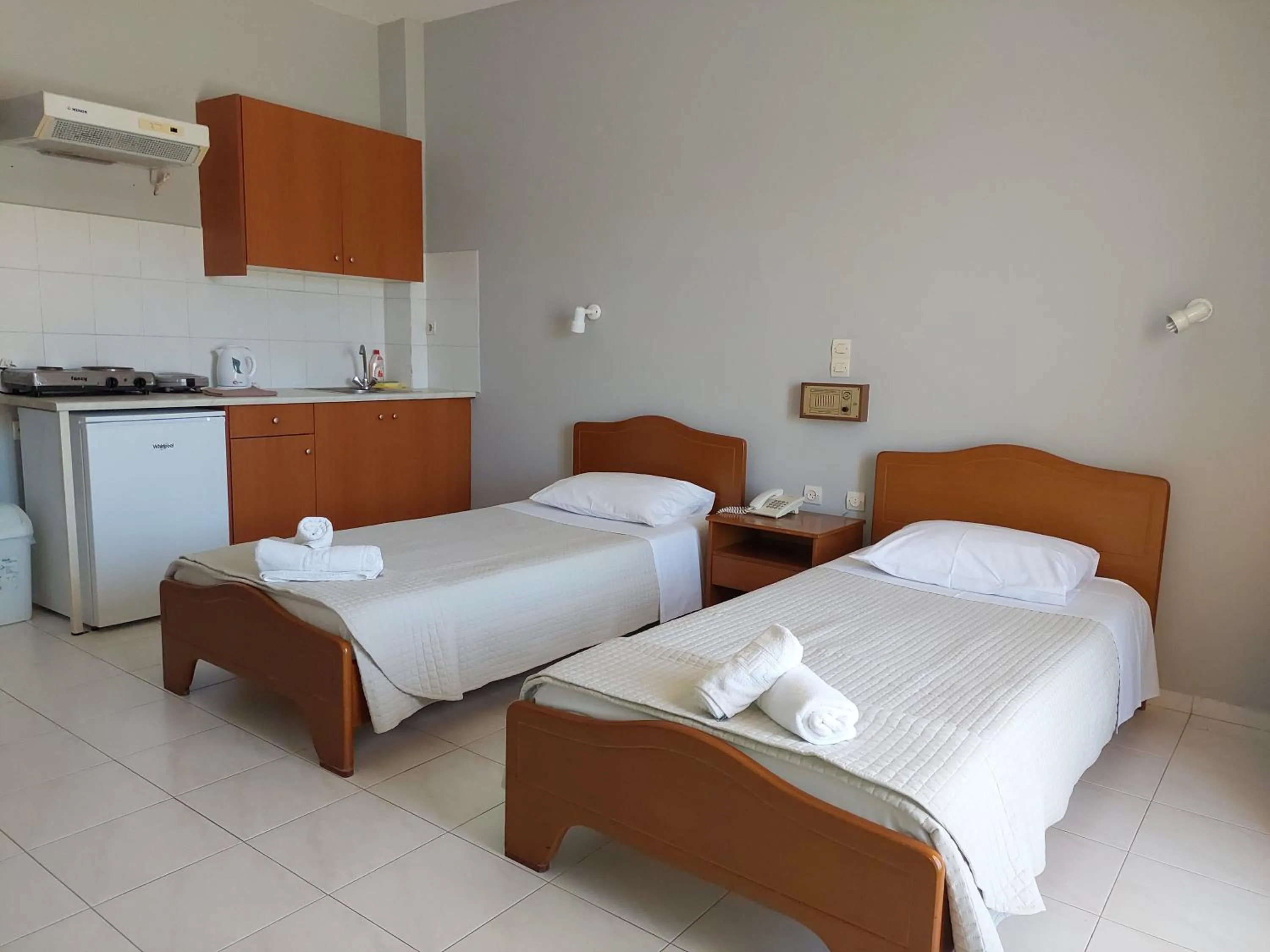 Bed in Ammousa Hotel Apartments