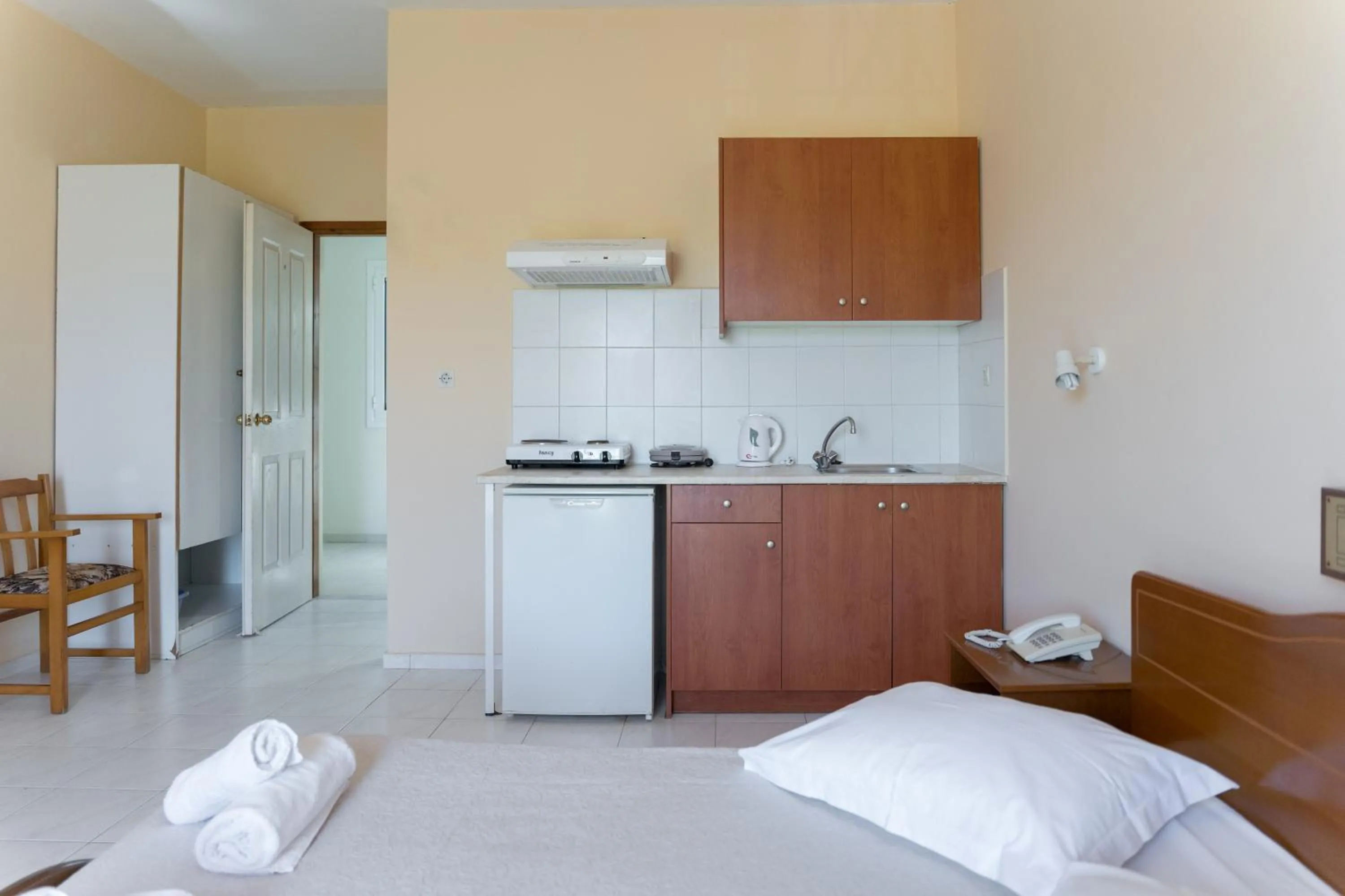 Bed in Ammousa Hotel Apartments