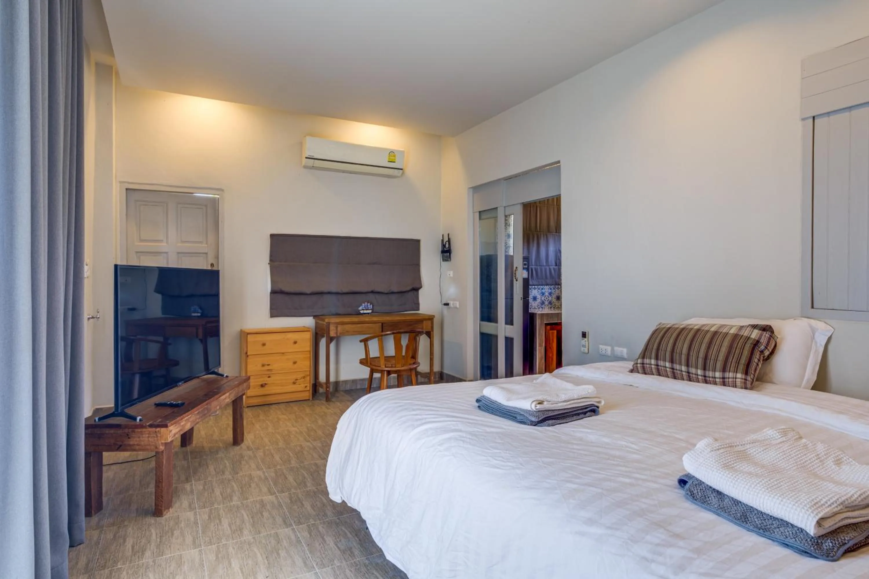 Bed in Artisan koh yao yai handcraft beachfront villas.