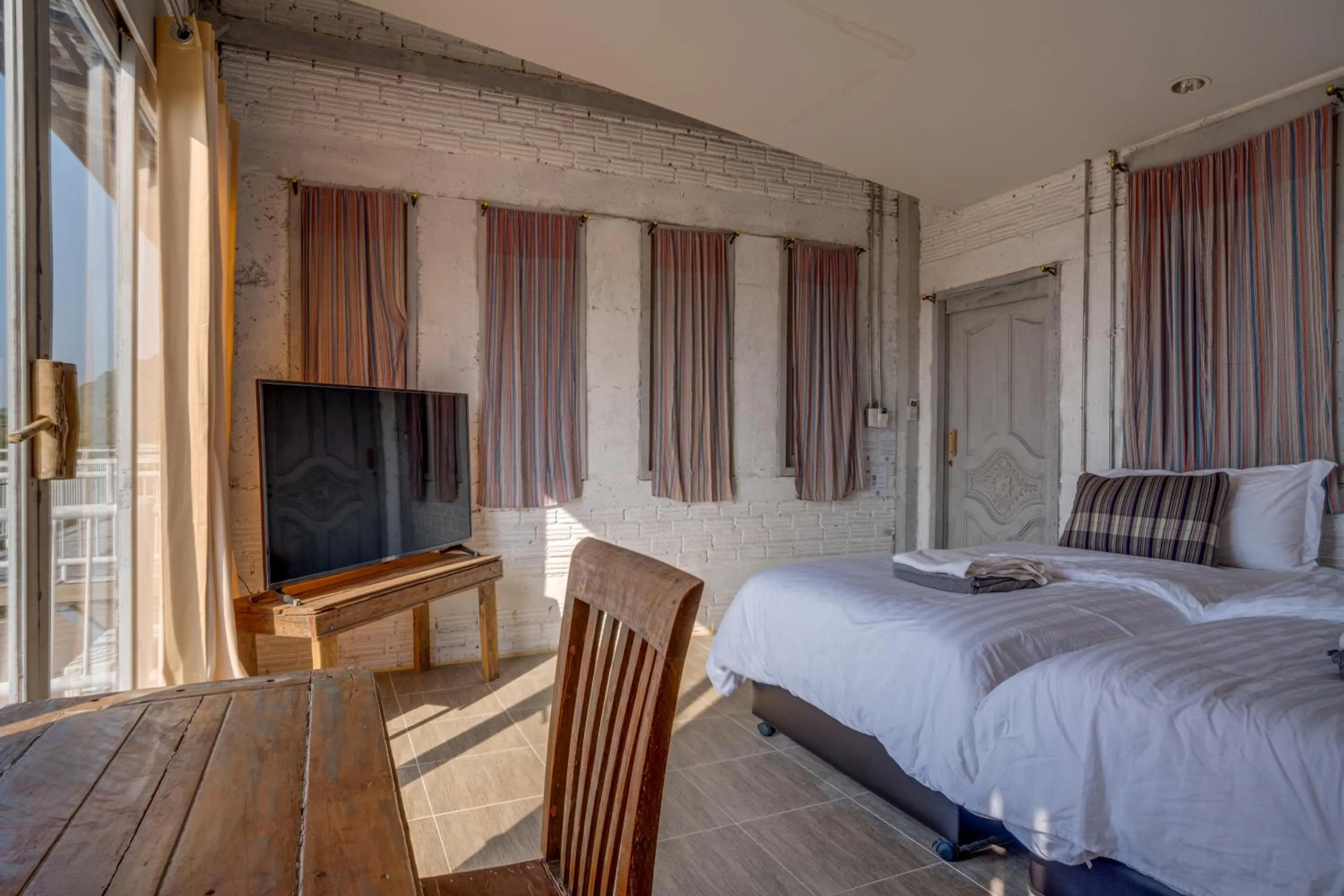 Bed in Artisan koh yao yai handcraft beachfront villas.