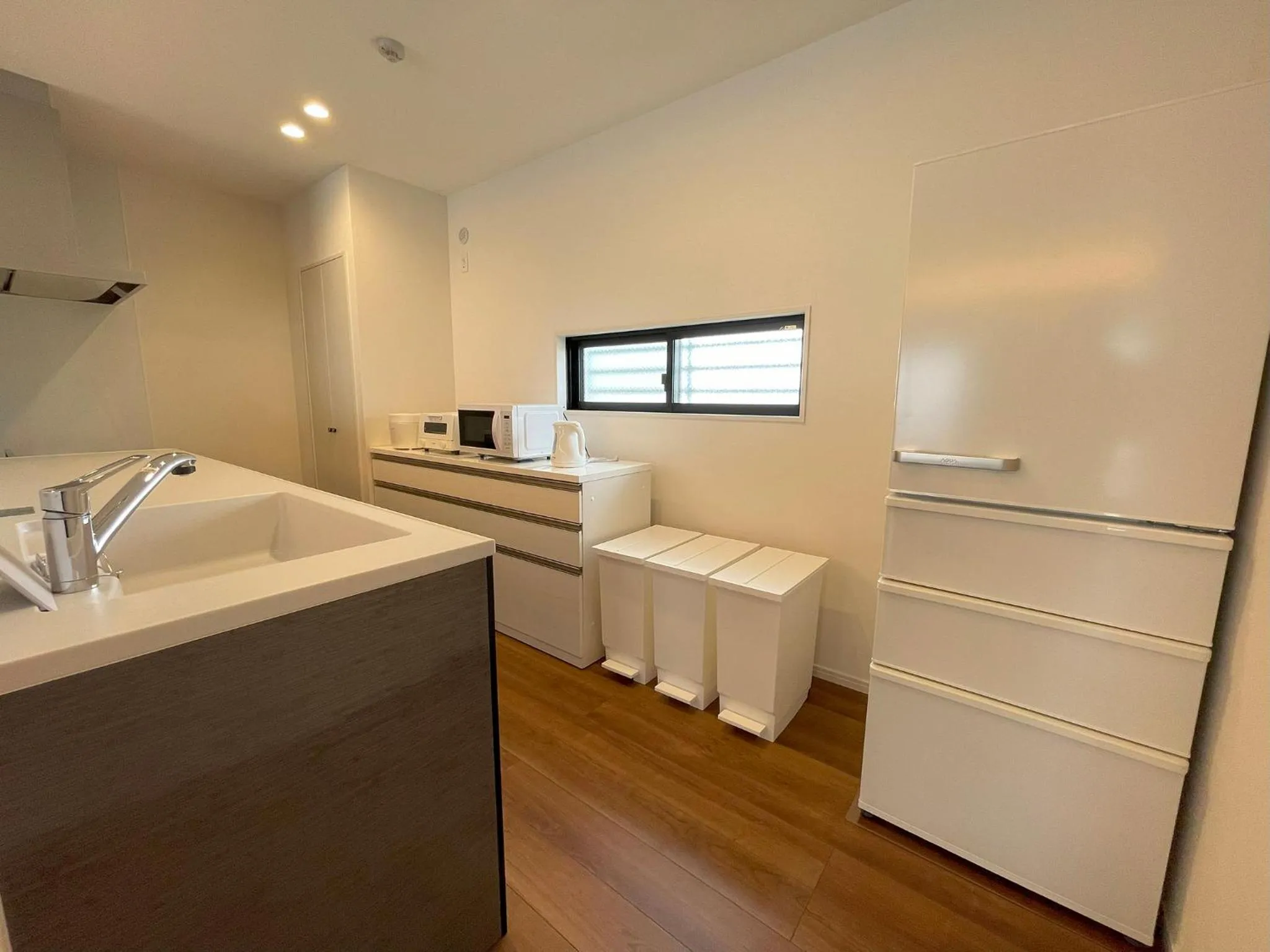 Kitchen or kitchenette in ＆Monde. Okinawa Arena Condominium