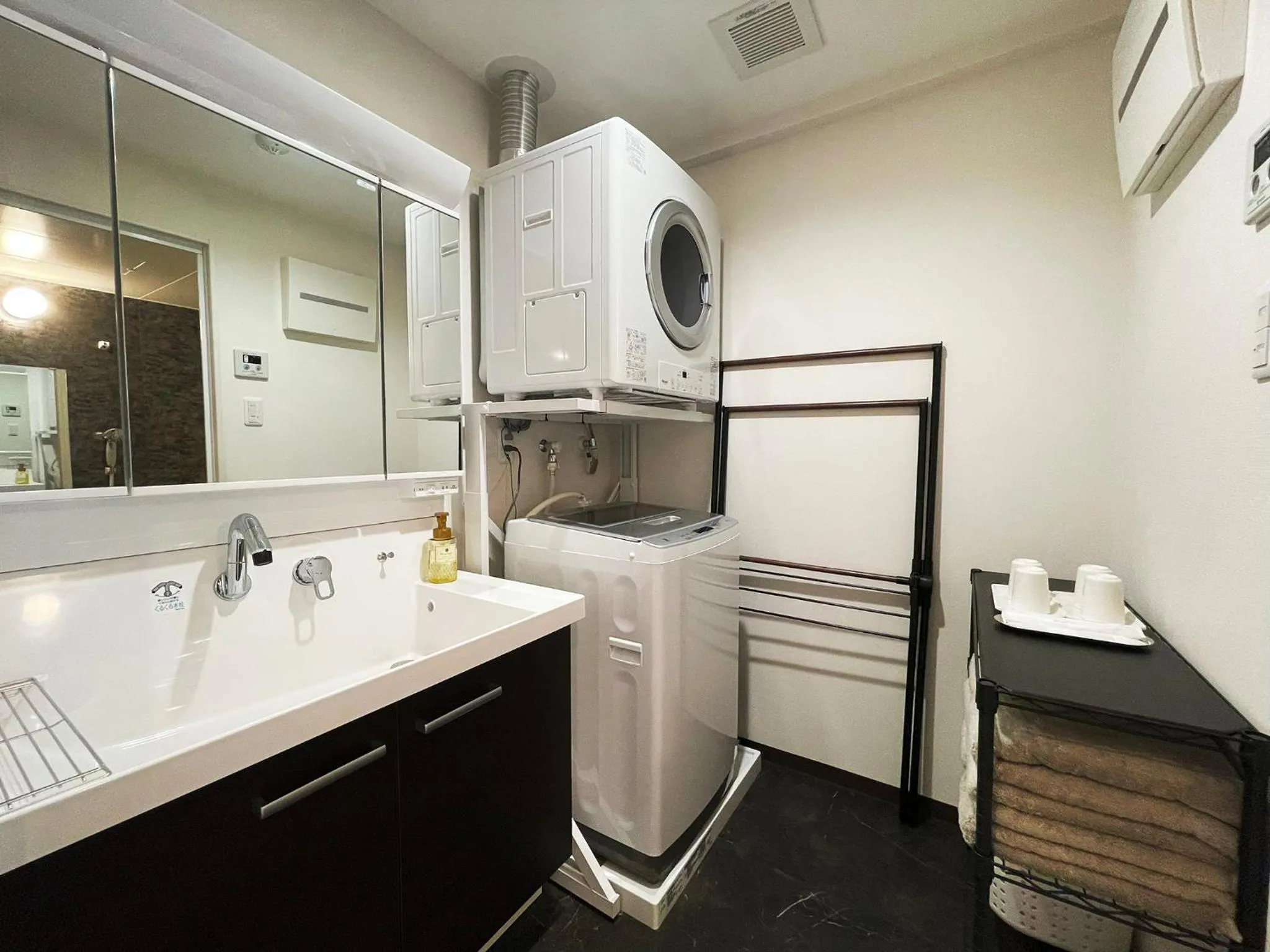 Bathroom, Bed in ＆Monde. Okinawa Arena Condominium