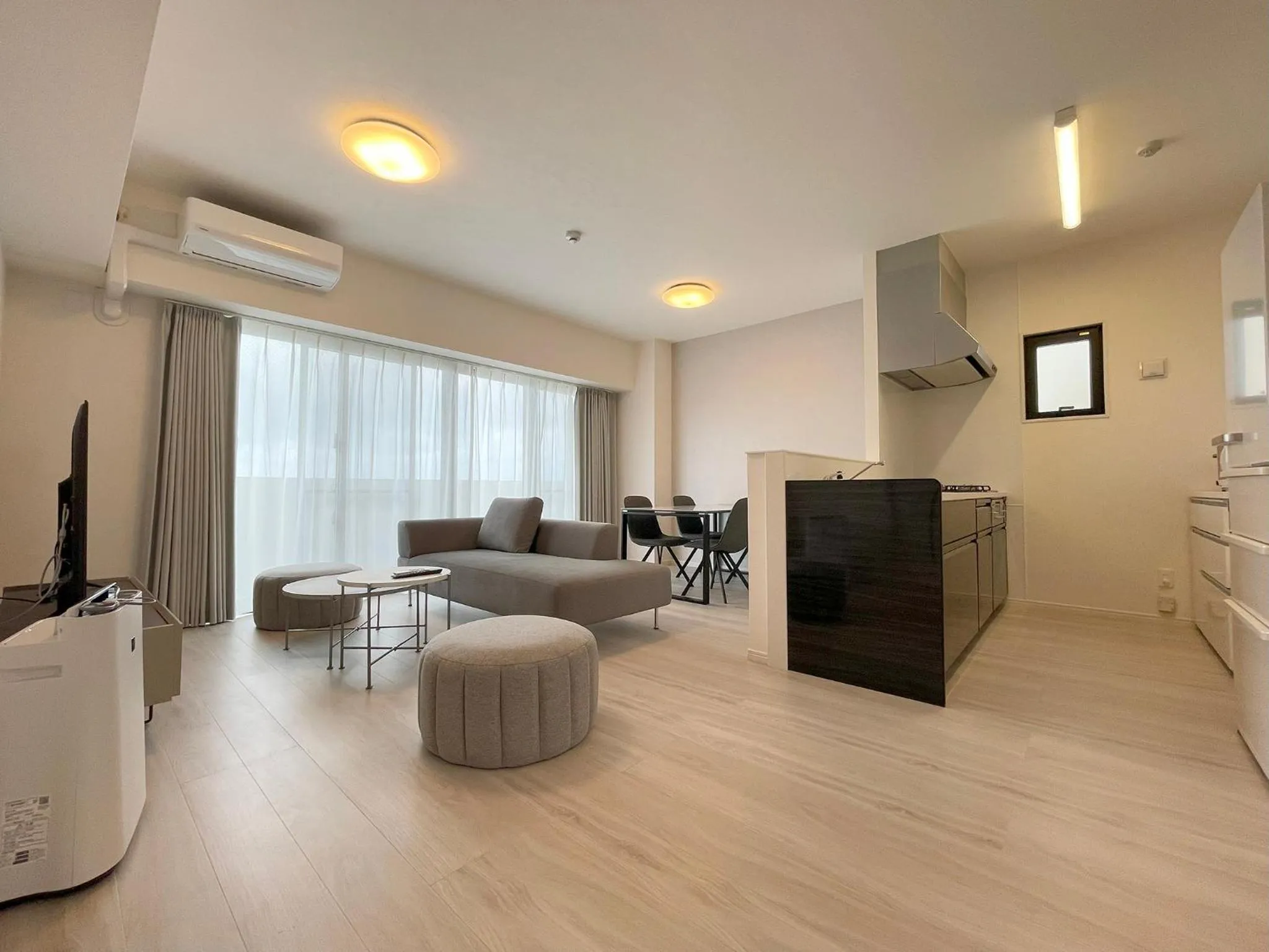 Living room in ＆Monde. Okinawa Arena Condominium