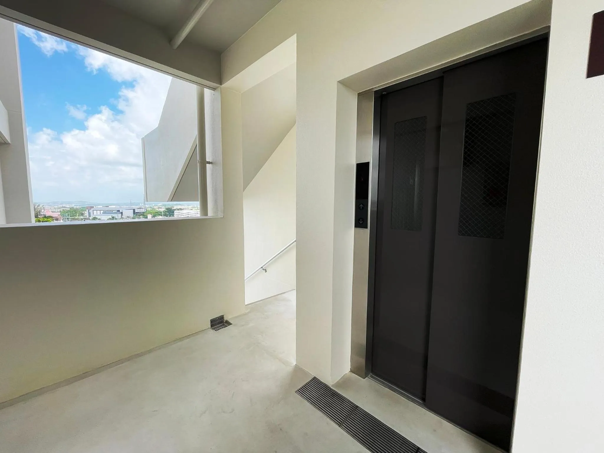 Property building in ＆Monde. Okinawa Arena Condominium