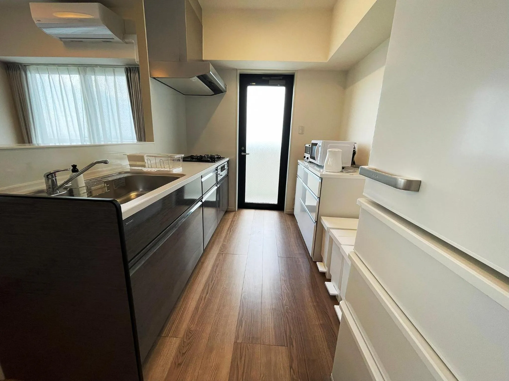 kitchen in ＆Monde. Okinawa Arena Condominium