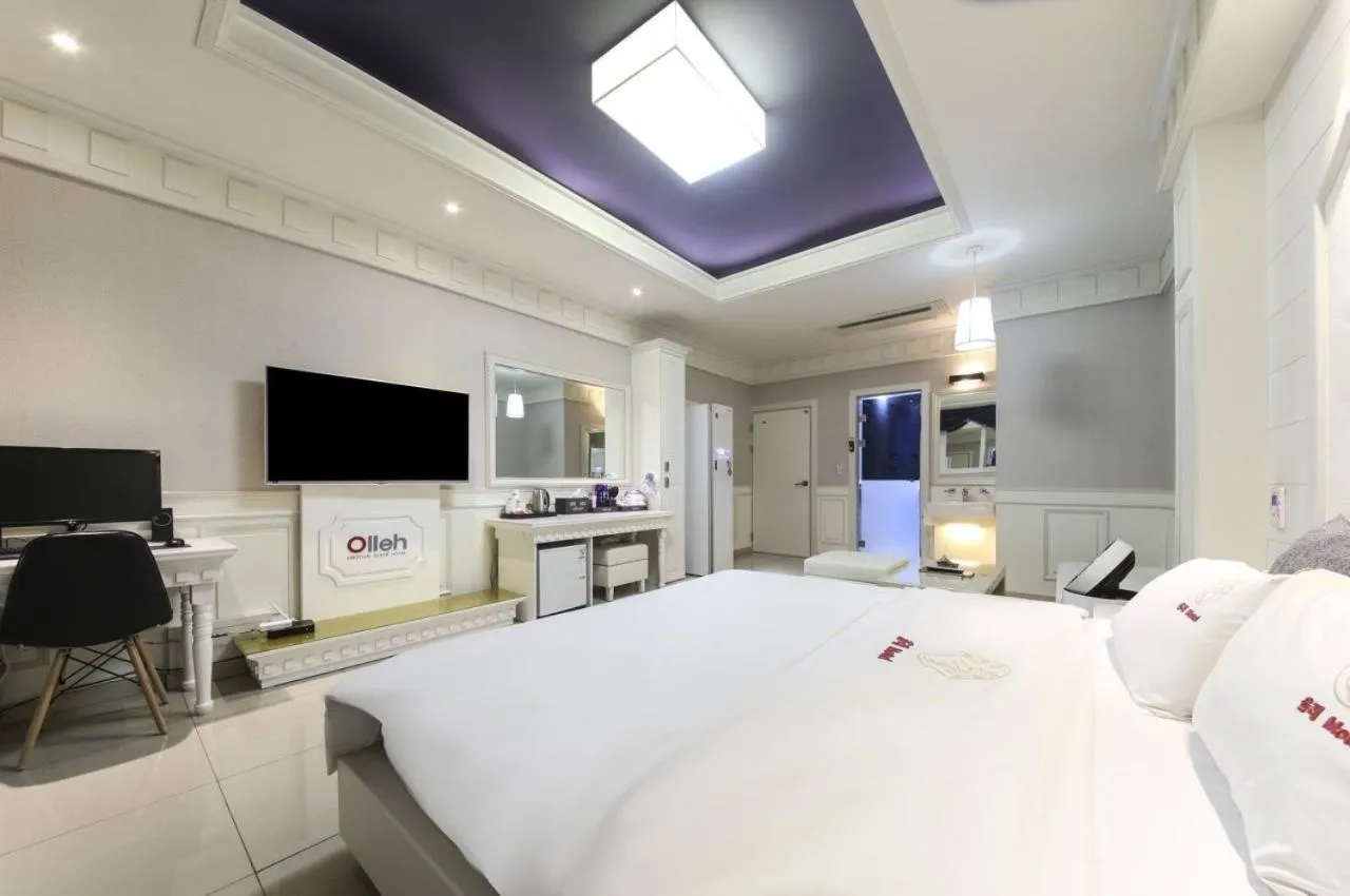 Bed in Olle Business Hotel