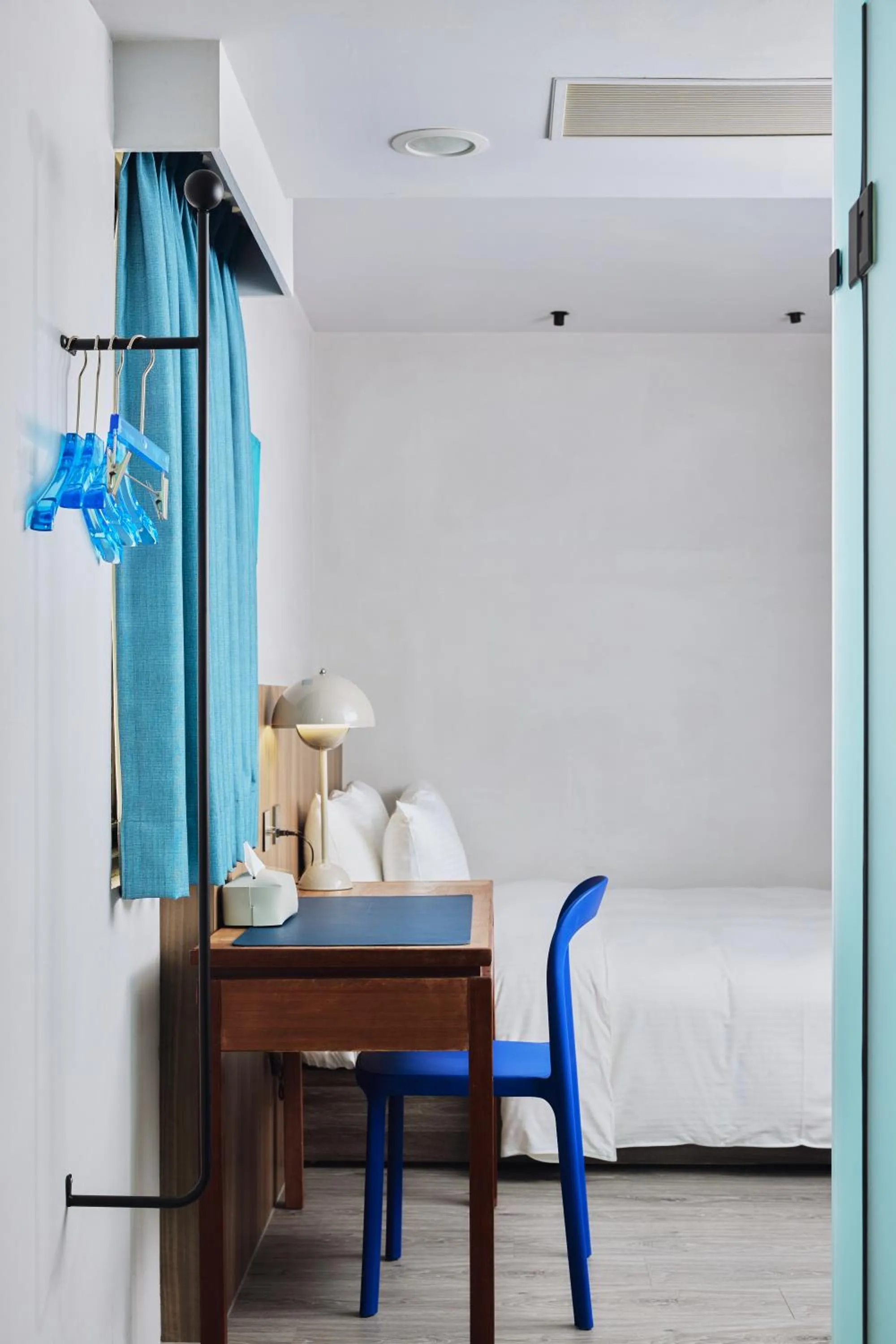 Seating area, Bed in The Blue by Just Inn