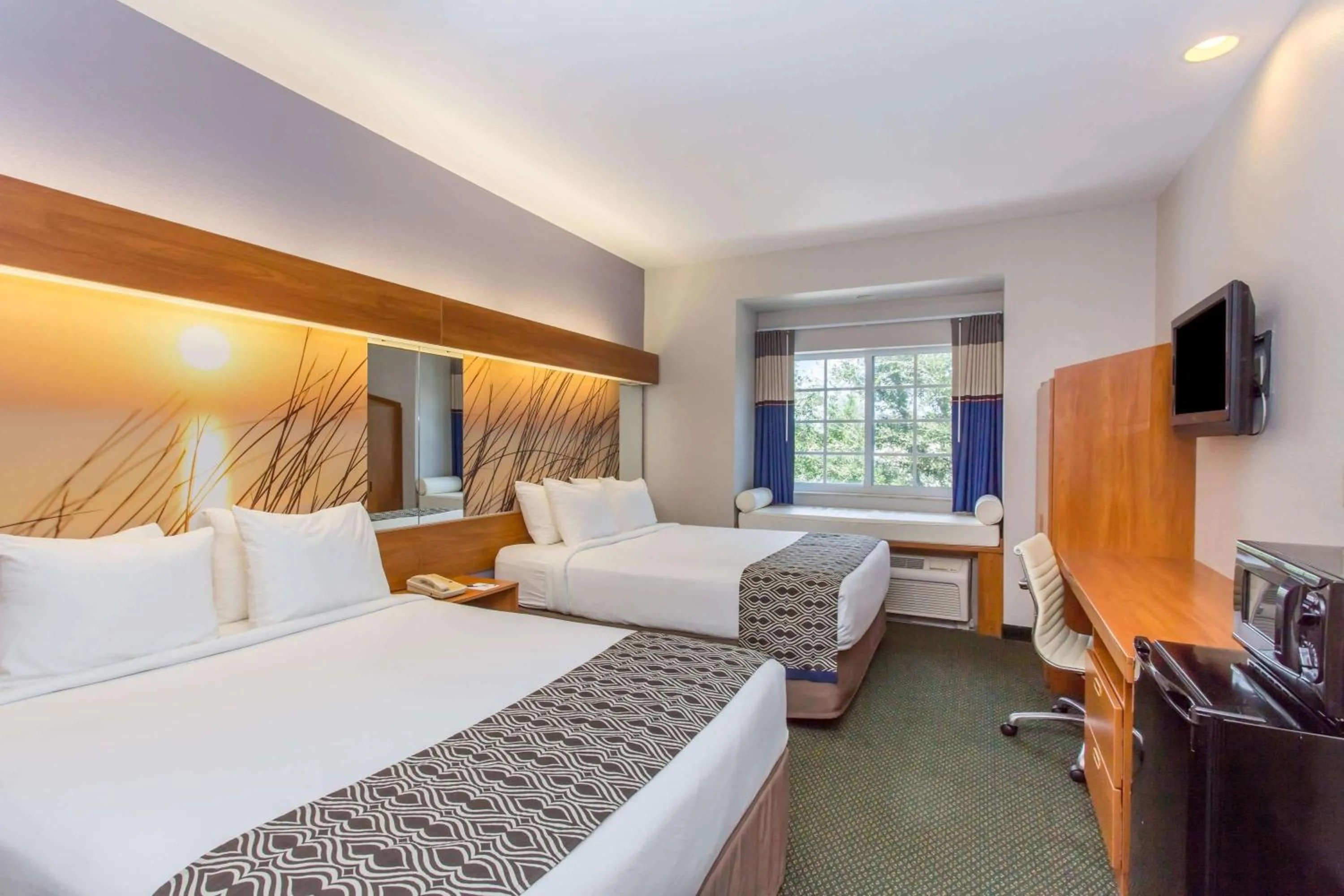 Photo of the whole room, Bed in Microtel Inn &amp; Suites by Wyndham Port Charlotte Punta Gorda