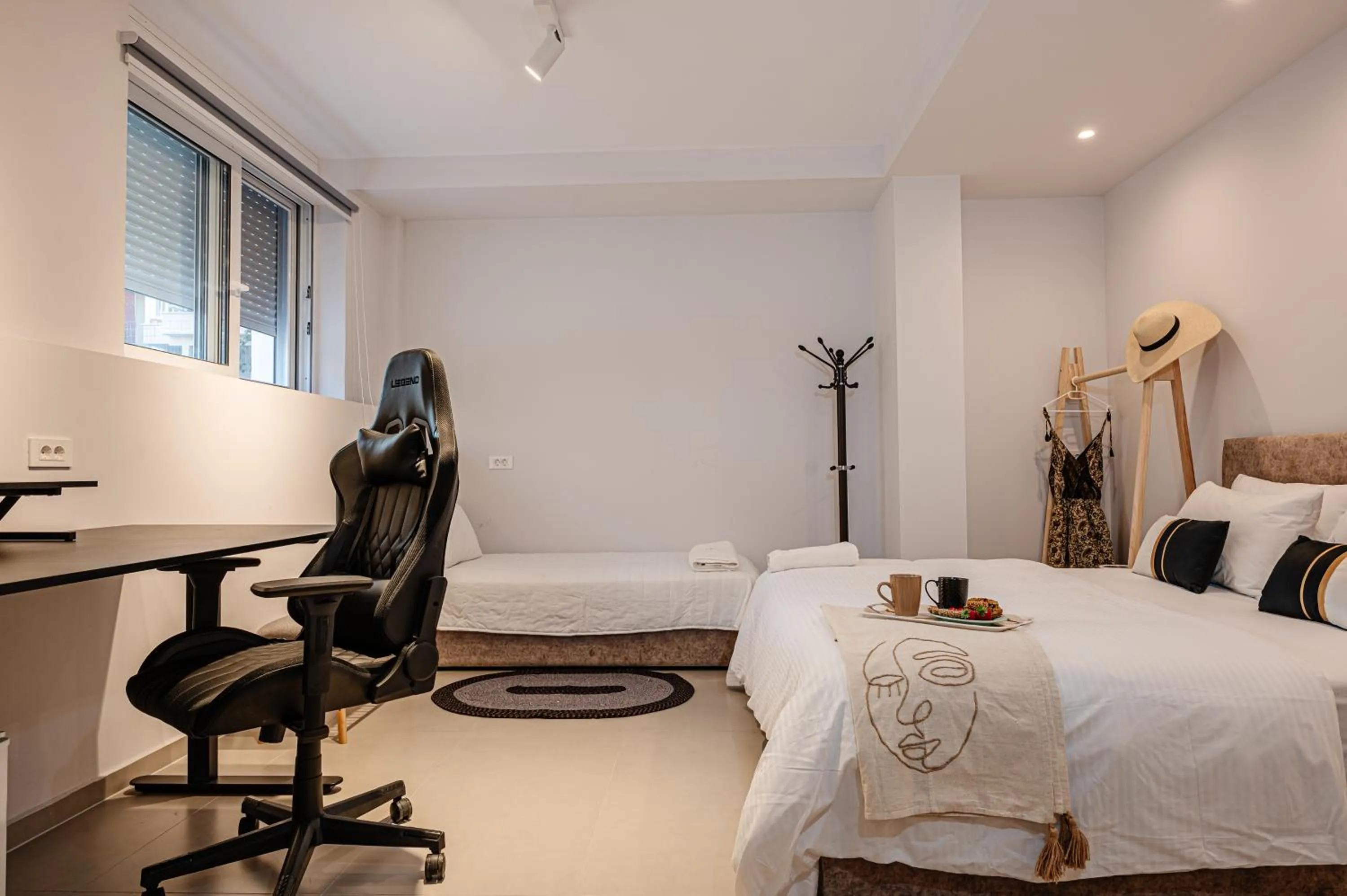 Bed in AMINA APARTMENTS