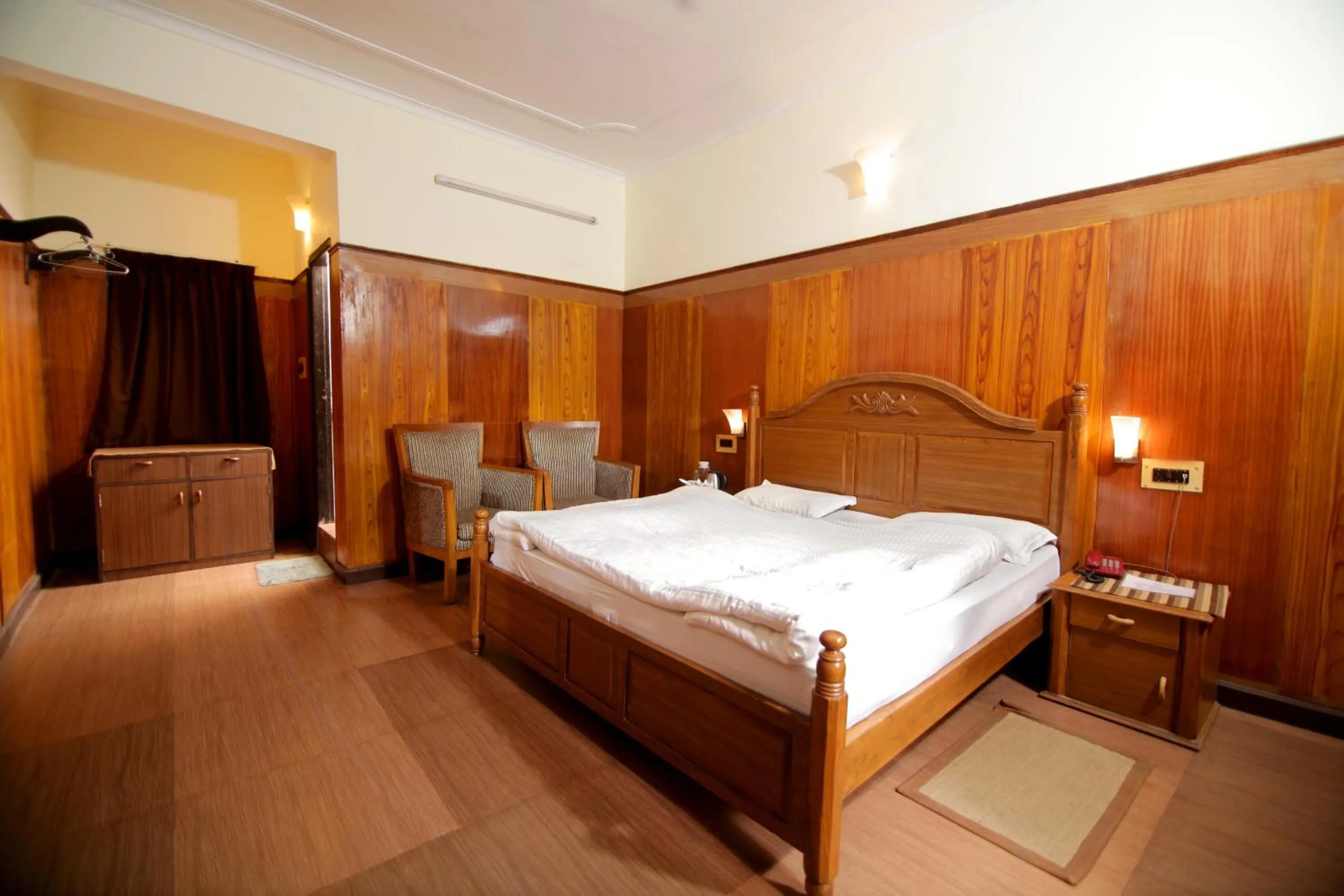 Bedroom in Ashoka Naini Chalet