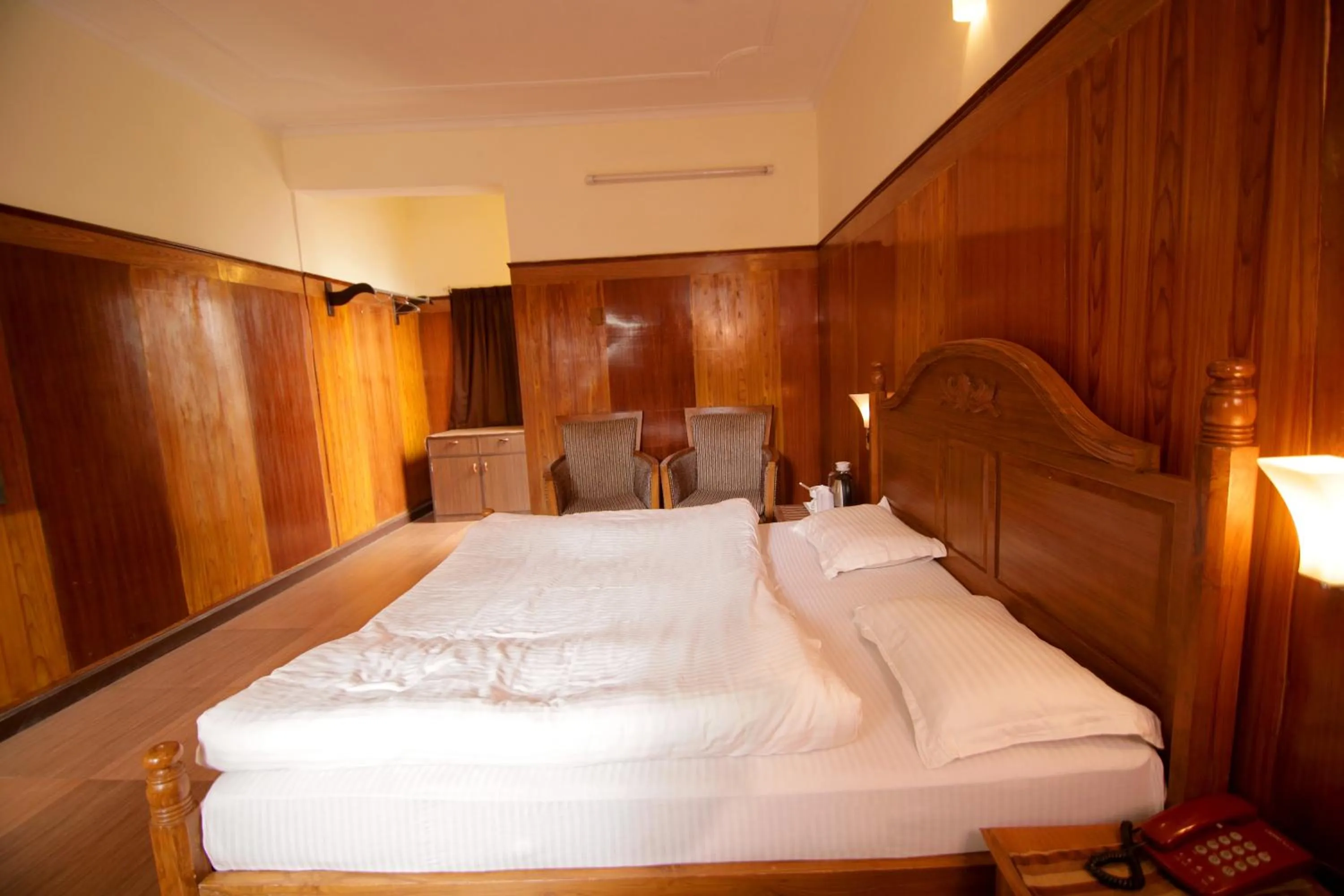 Bedroom in Ashoka Naini Chalet