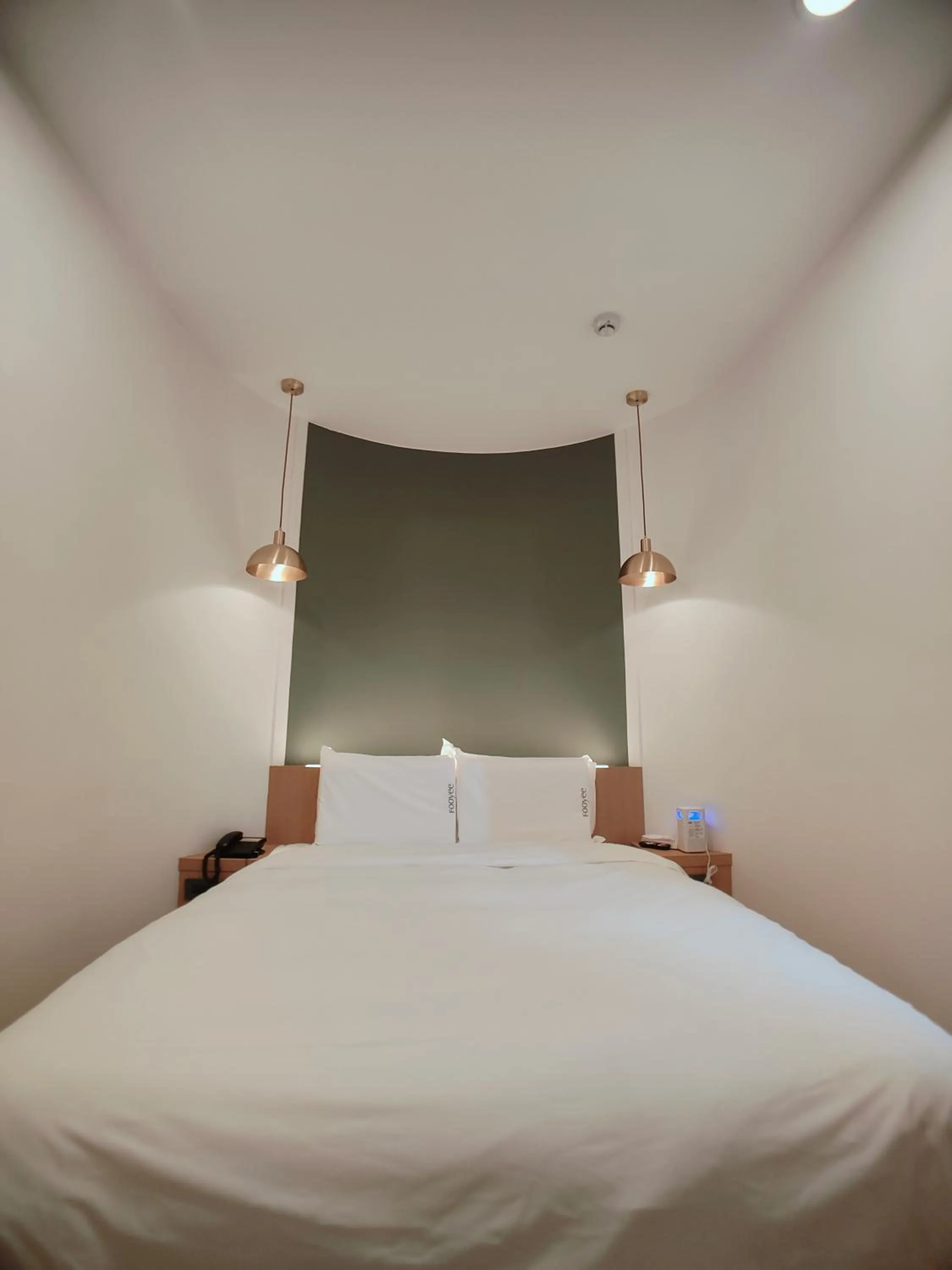 Bed in Fooyee Hotel Wenxin Zhongqing