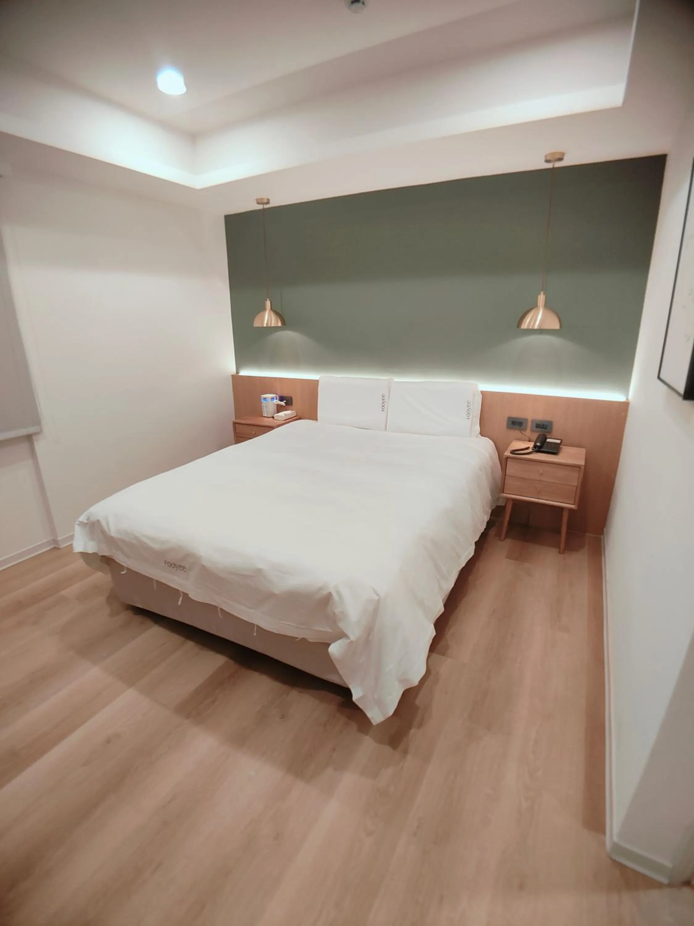 Bed in Fooyee Hotel Wenxin Zhongqing