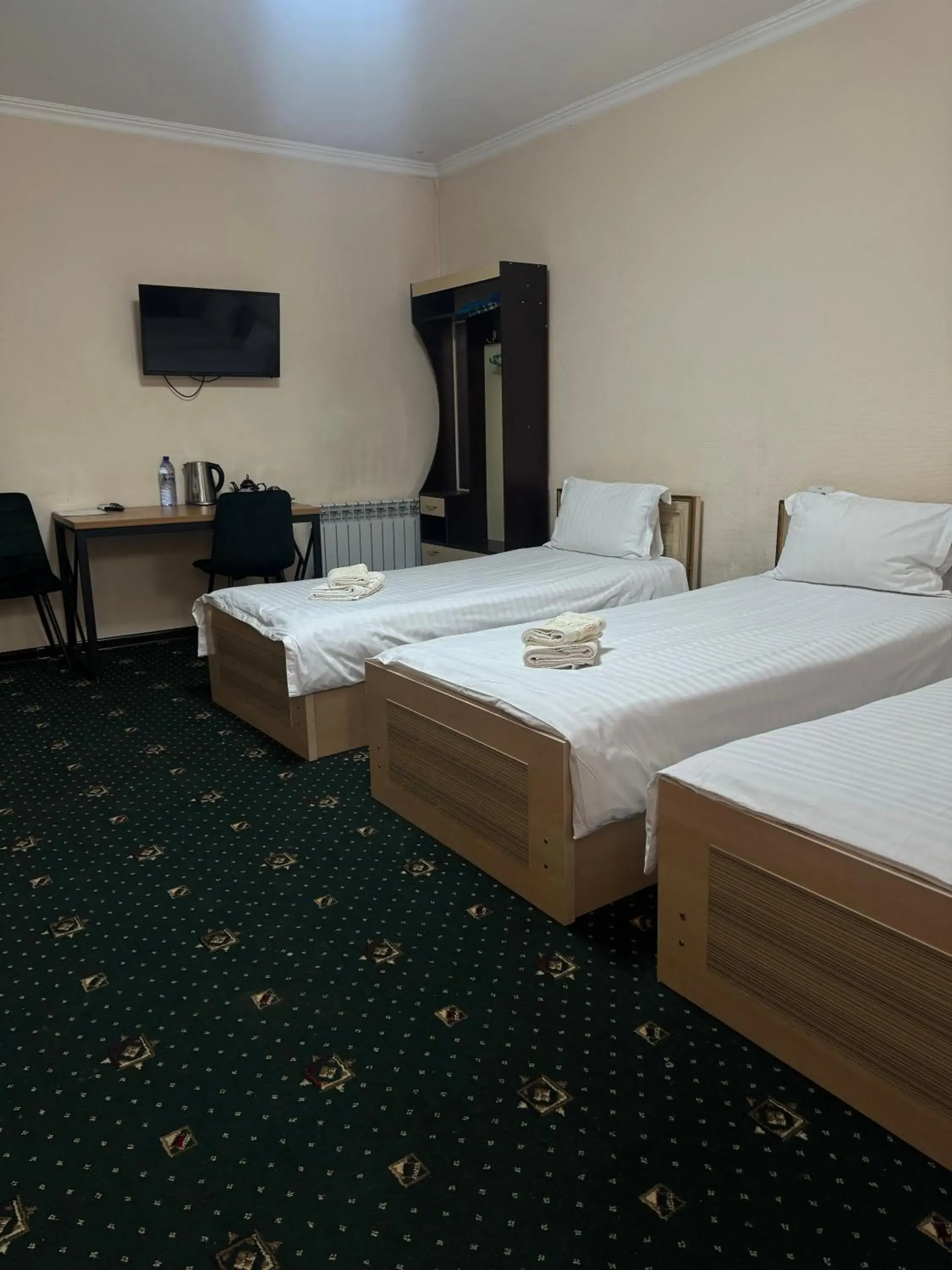 Quadruple Room - single occupancy in Boston Hotel Tashkent Quadruple Room - single occupancy in Boston Hotel Tashkent