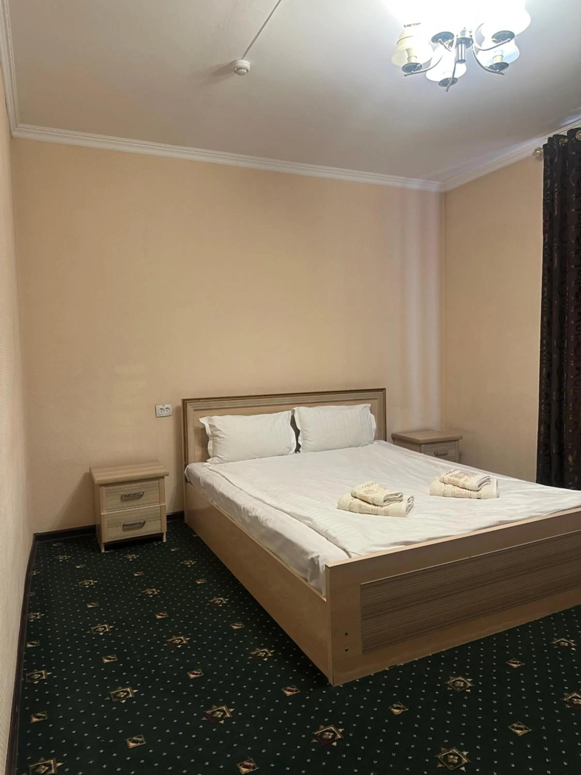 Bed in Boston Hotel Tashkent