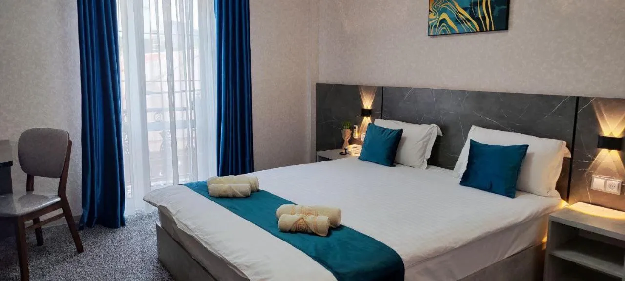 Photo of the whole room, Bed in Boston Hotel Tashkent