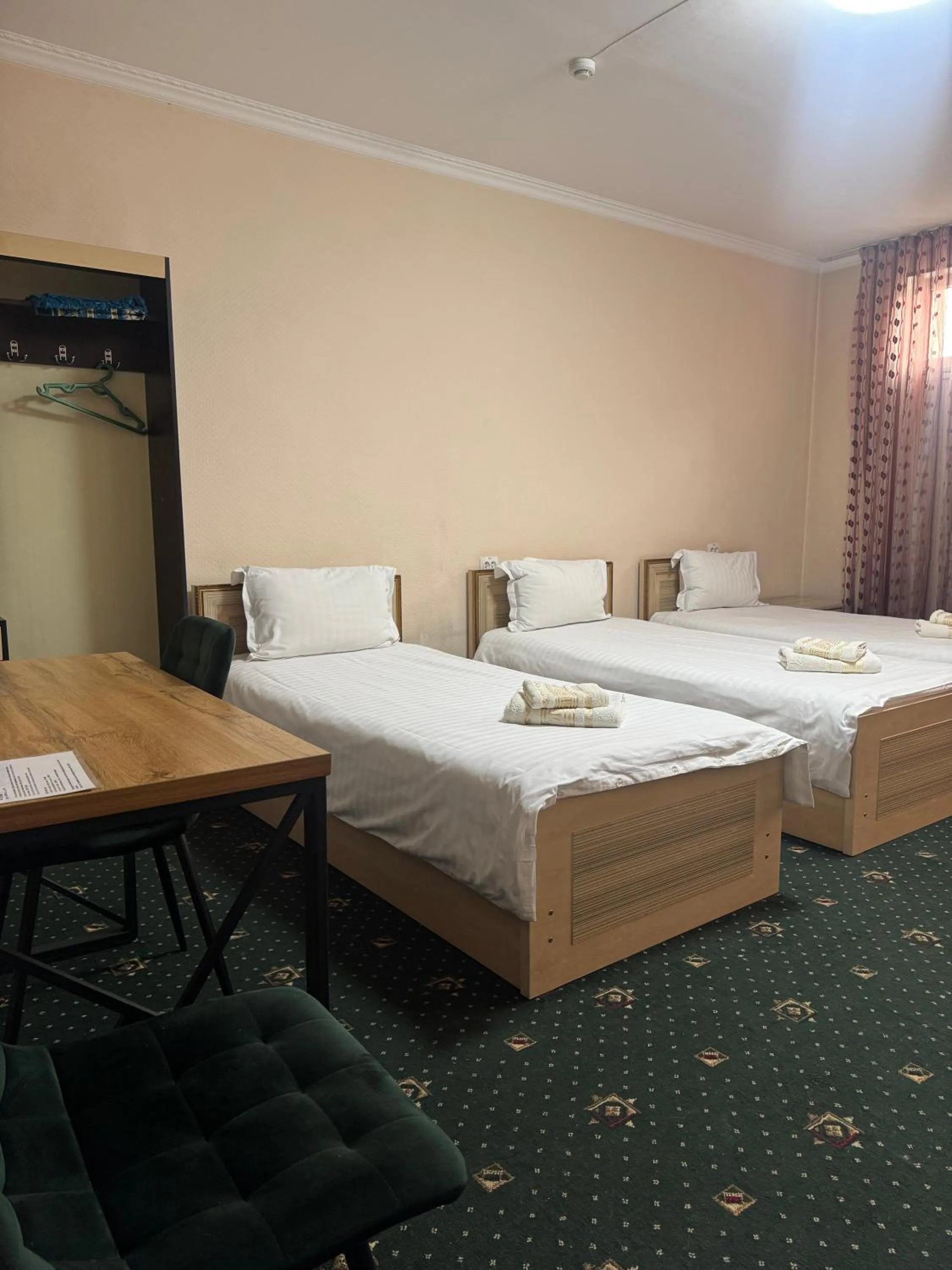 Bed in Boston Hotel Tashkent