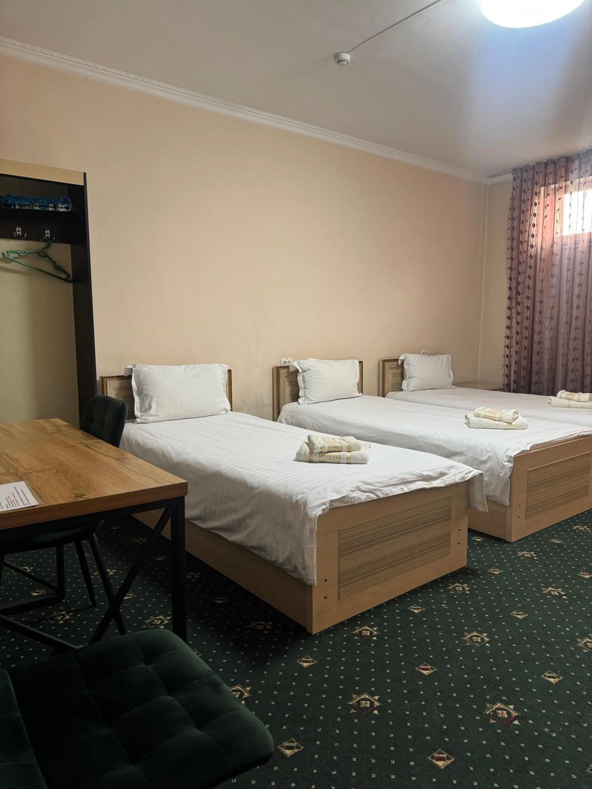 Bed in Boston Hotel Tashkent