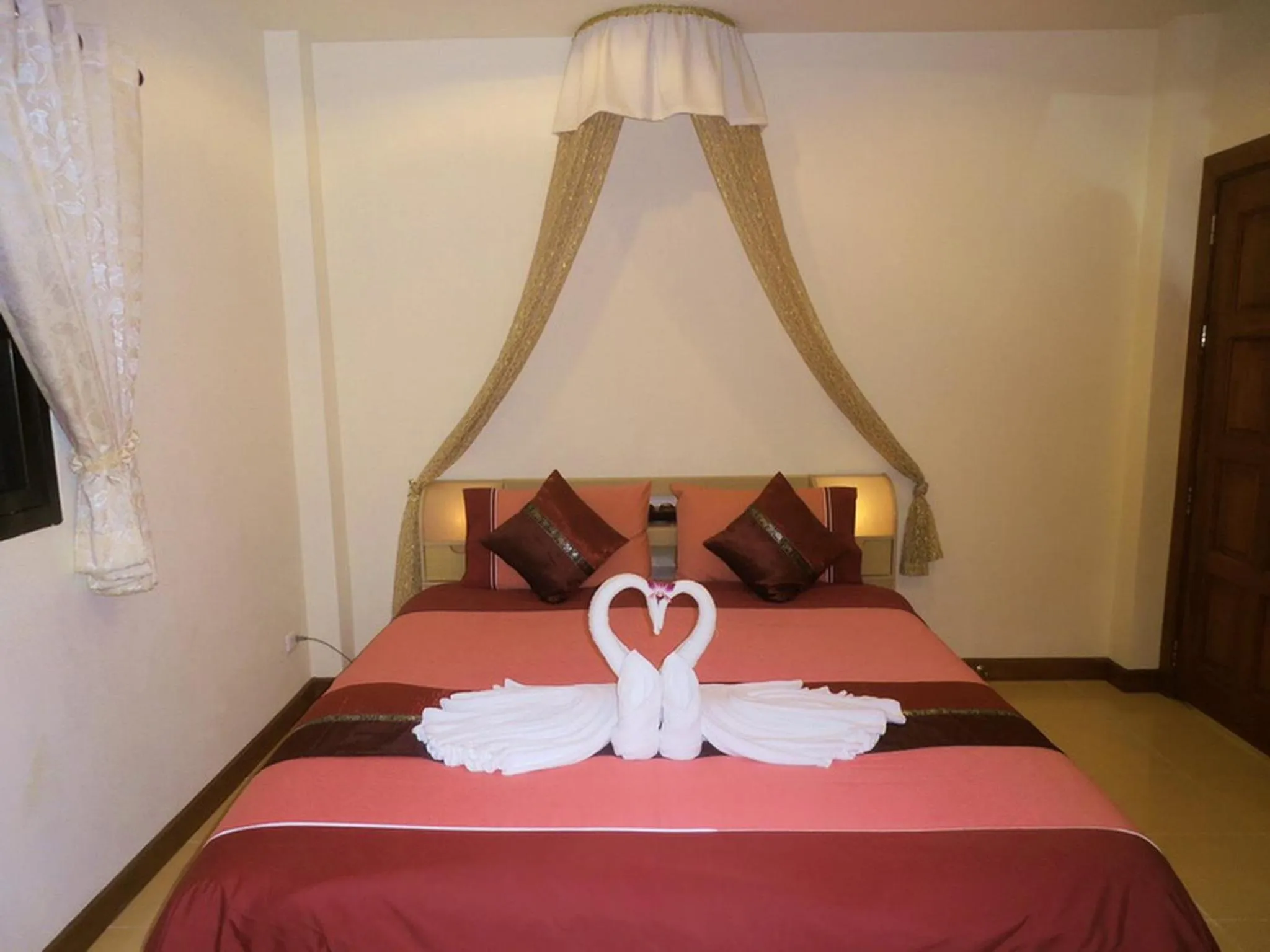 Bedroom in Coconut Paradise Holiday Villas