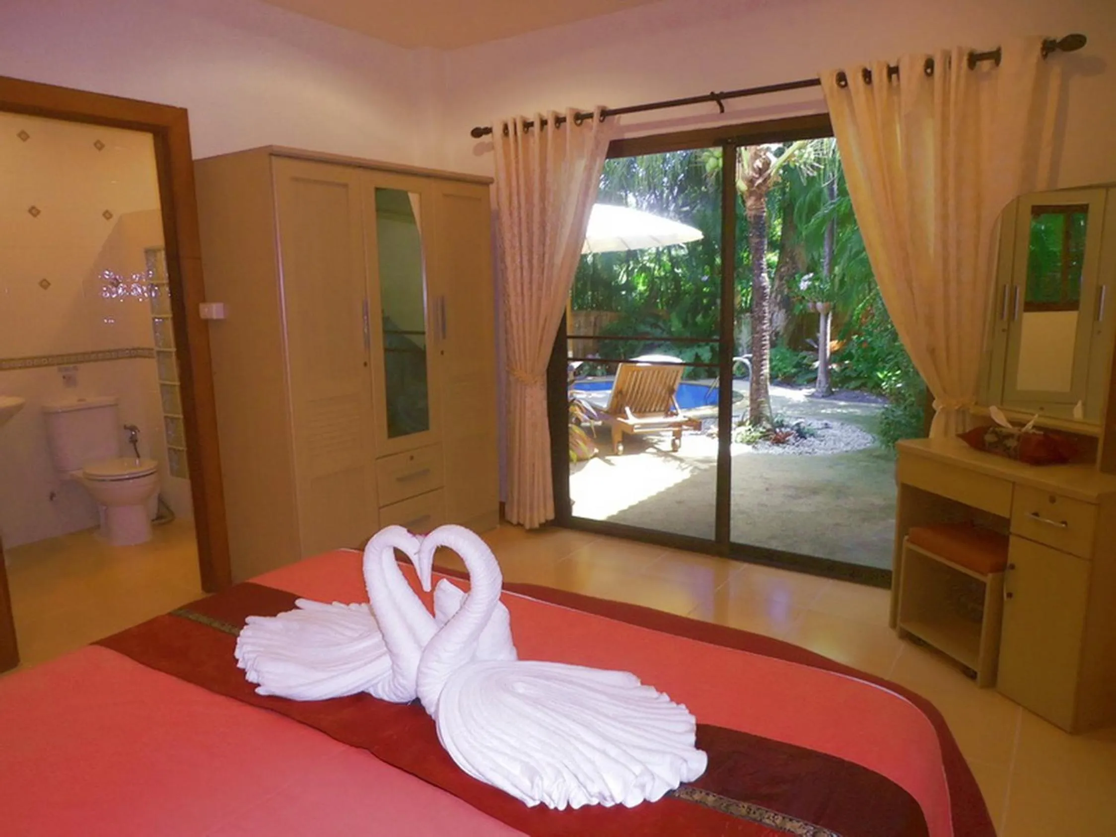 Bedroom in Coconut Paradise Holiday Villas