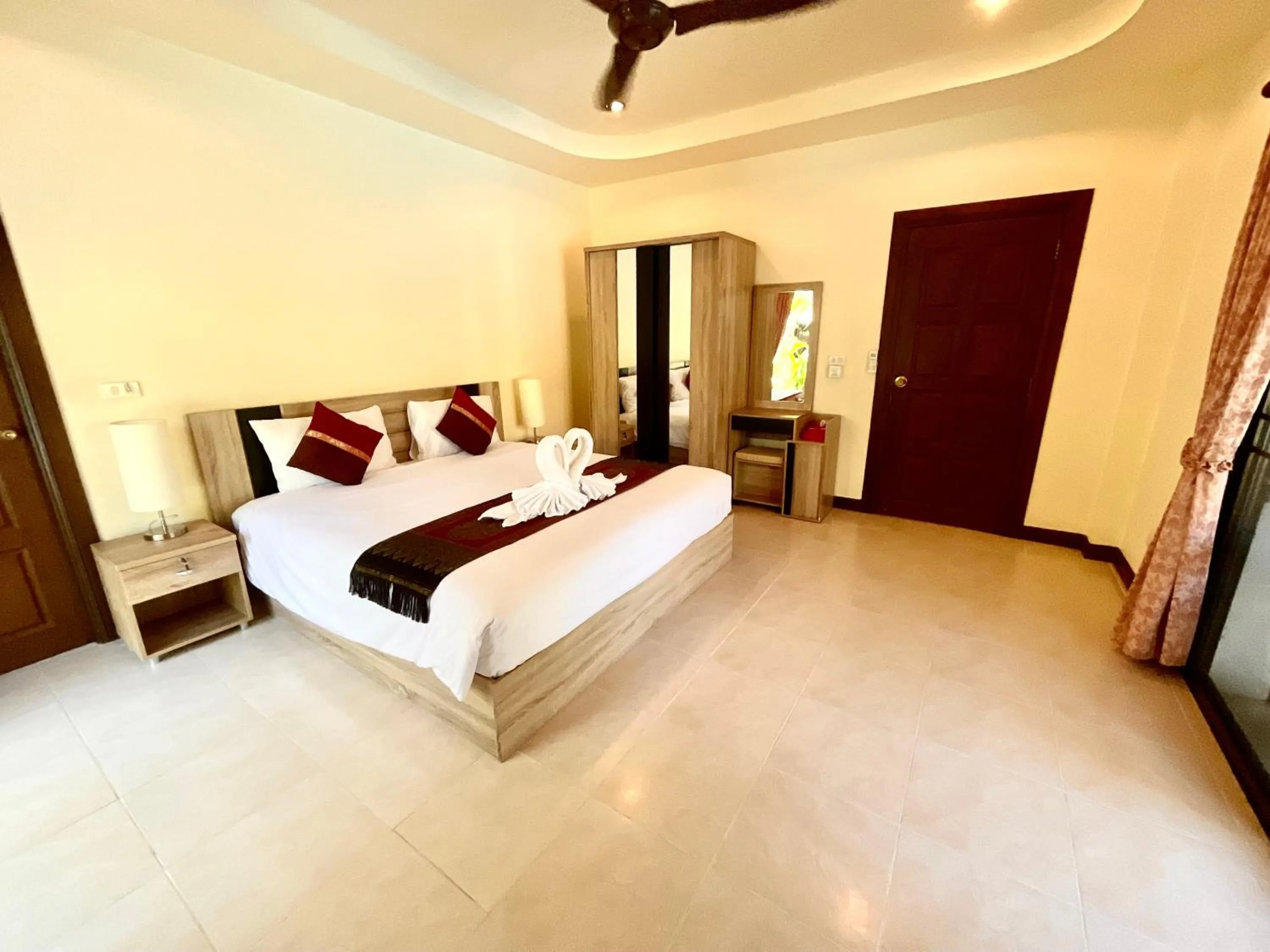 Bedroom in Coconut Paradise Holiday Villas