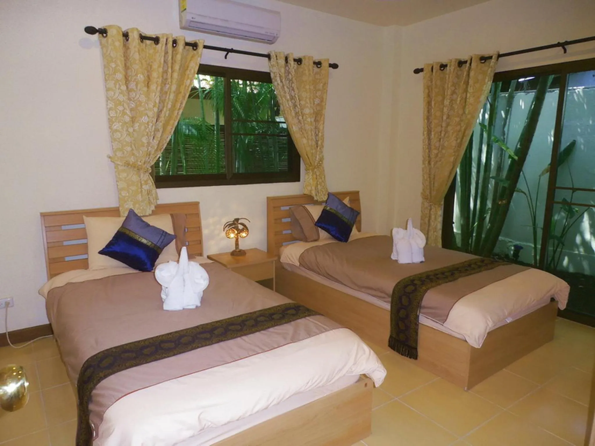 Bedroom in Coconut Paradise Holiday Villas