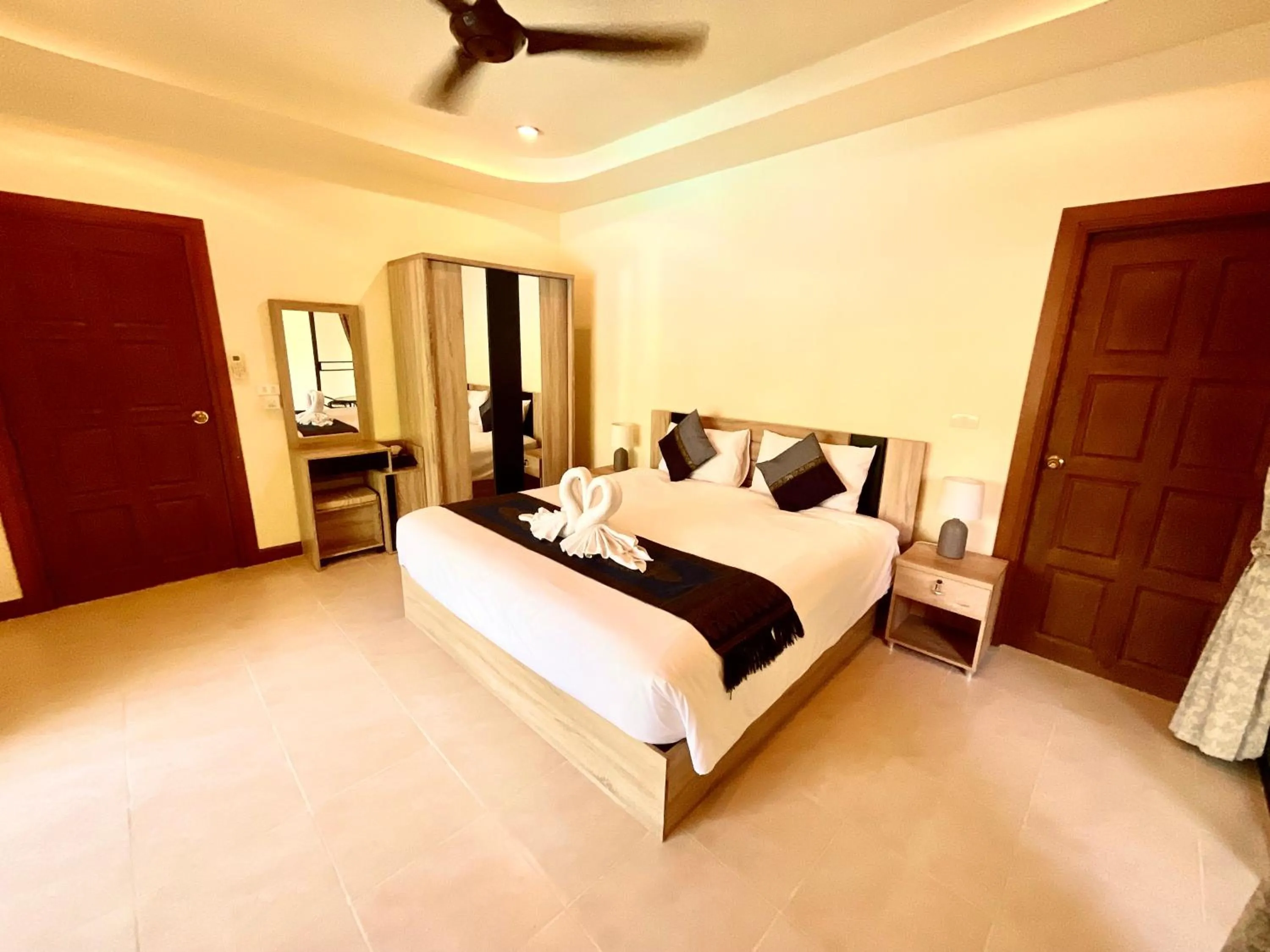 Bedroom in Coconut Paradise Holiday Villas