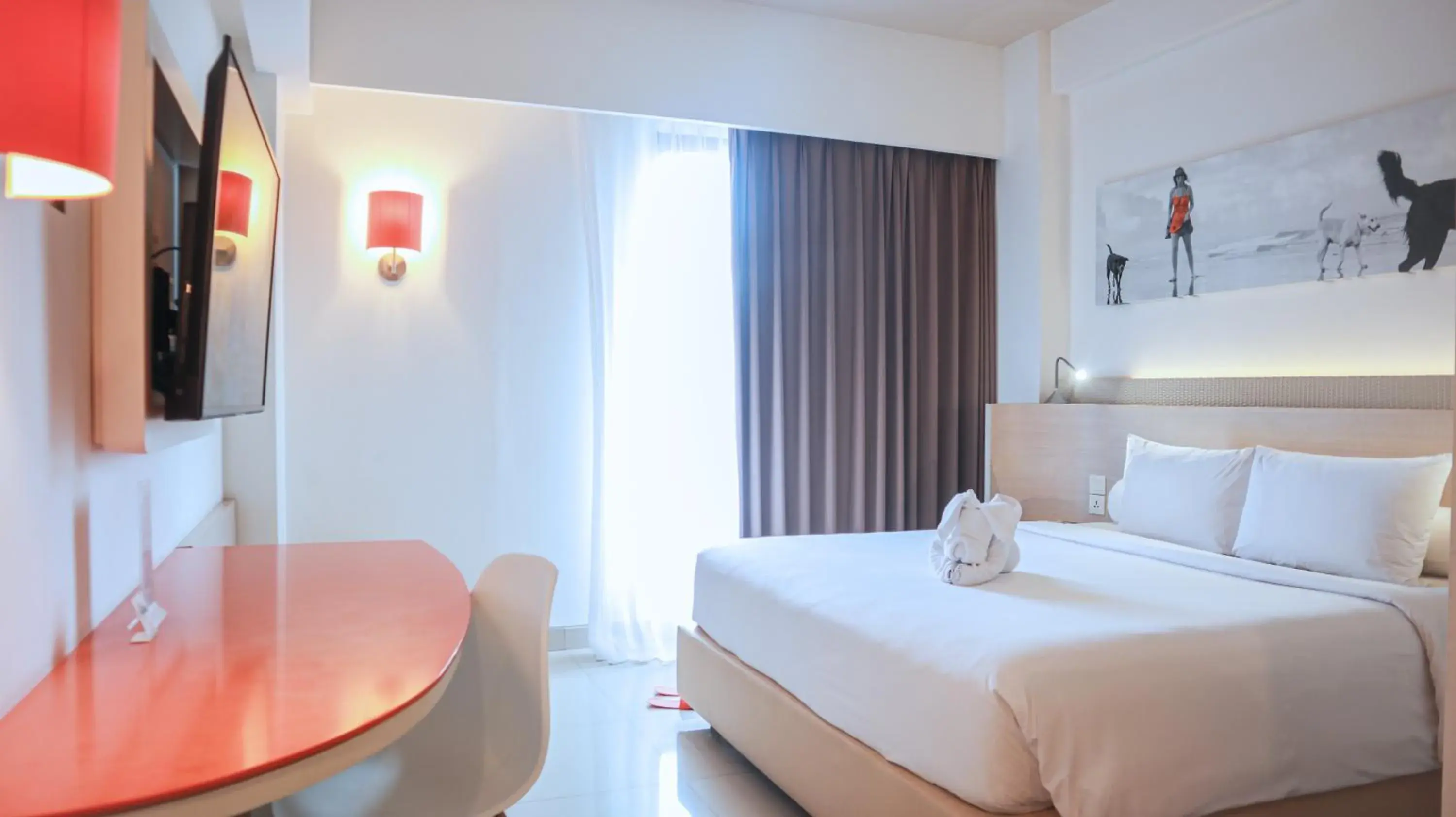 Bed in HARRIS Hotel Seminyak Bed in HARRIS Hotel Seminyak