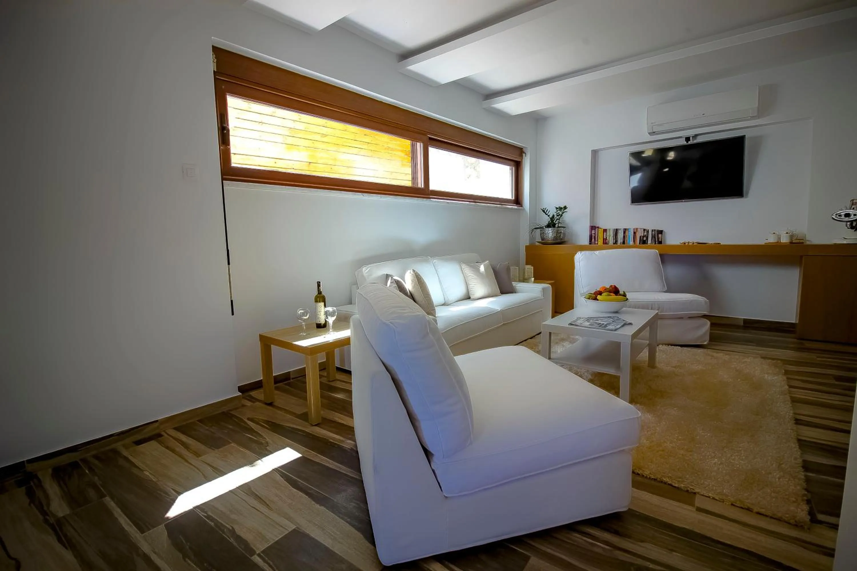 Communal lounge/ TV room in Lindos Beauty