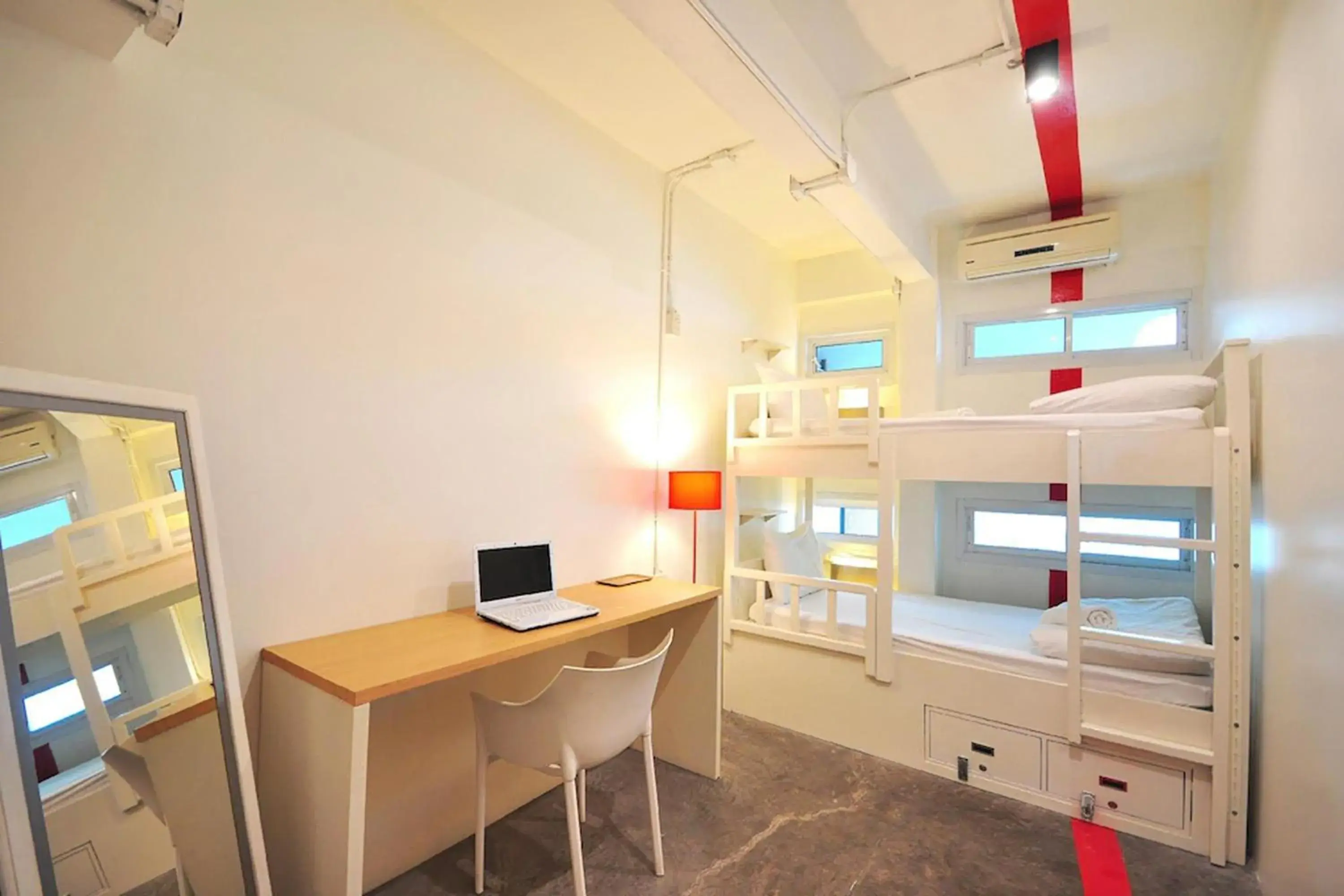 Twin bunk bed with Shared Bathroom (upper floor) in Qilombo Hostel Silom Twin bunk bed with Shared Bathroom (upper floor) in Qilombo Hostel Silom