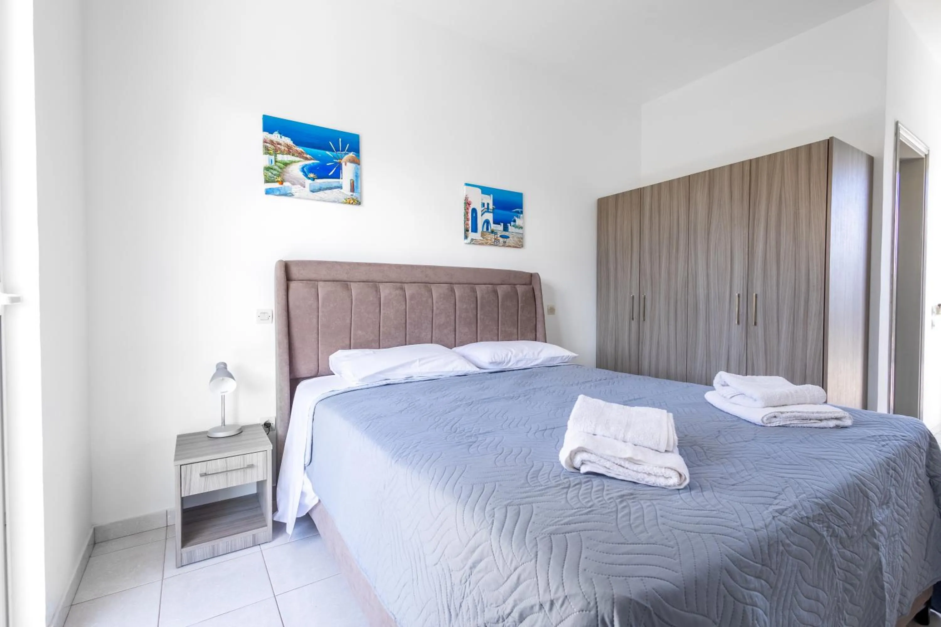 Bed in Johnhara Studios & Apartments