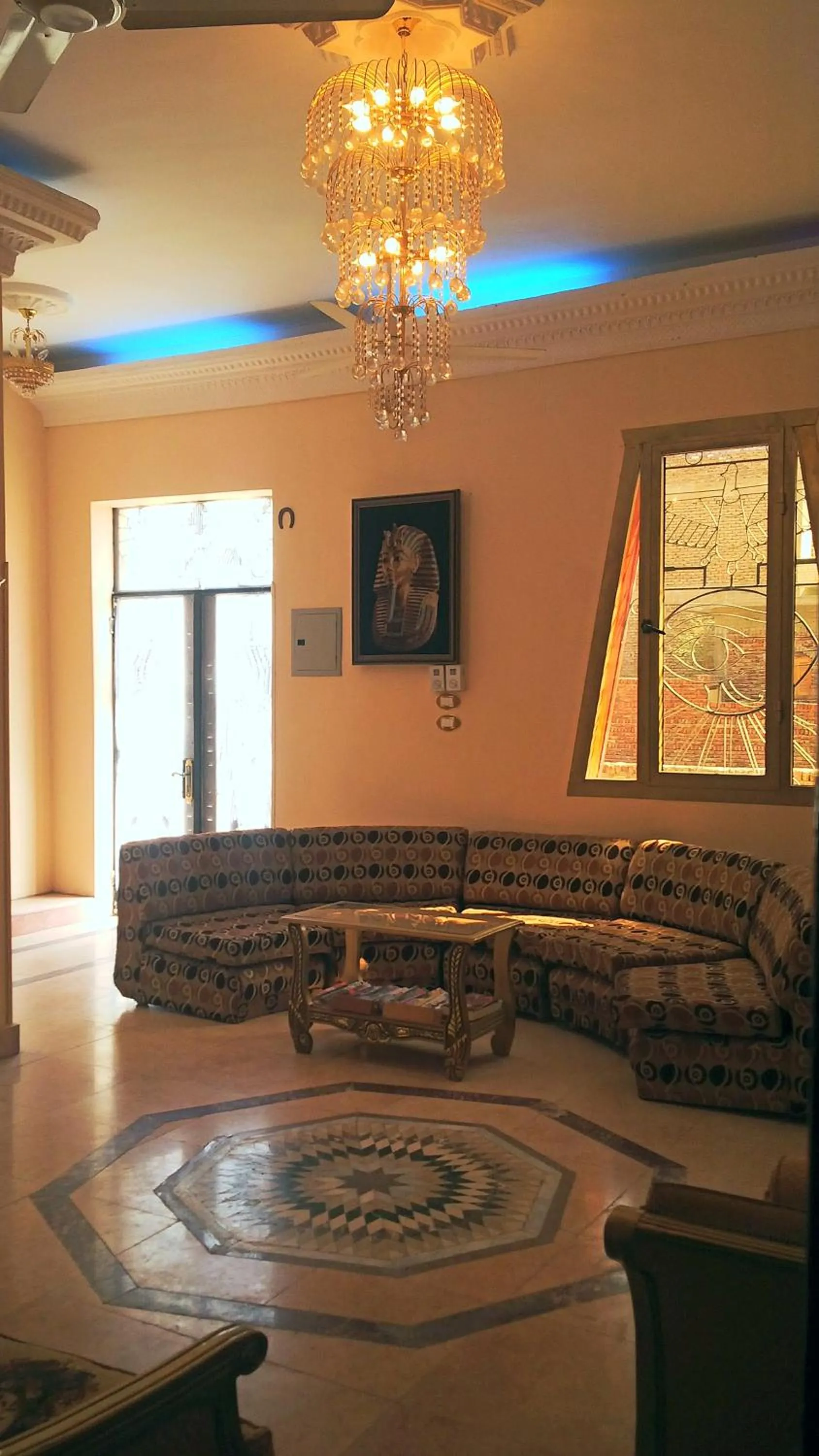 Communal lounge/ TV room in Pyramids Luxor Hotel & SPA