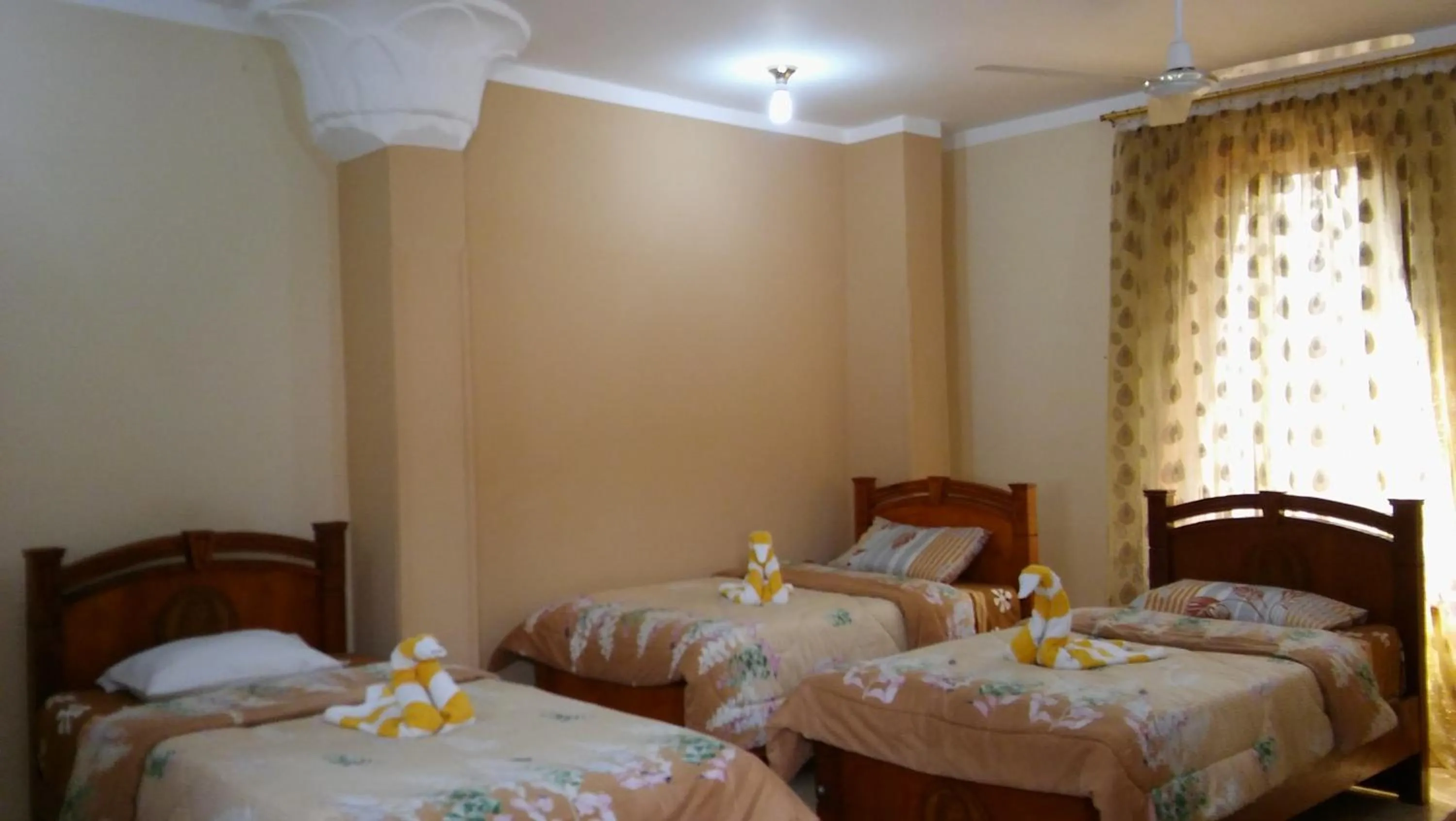 Photo of the whole room, Bed in Pyramids Luxor Hotel & SPA