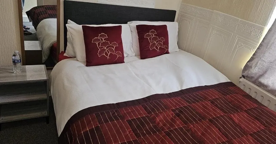 Bed in North Ocean Hotel