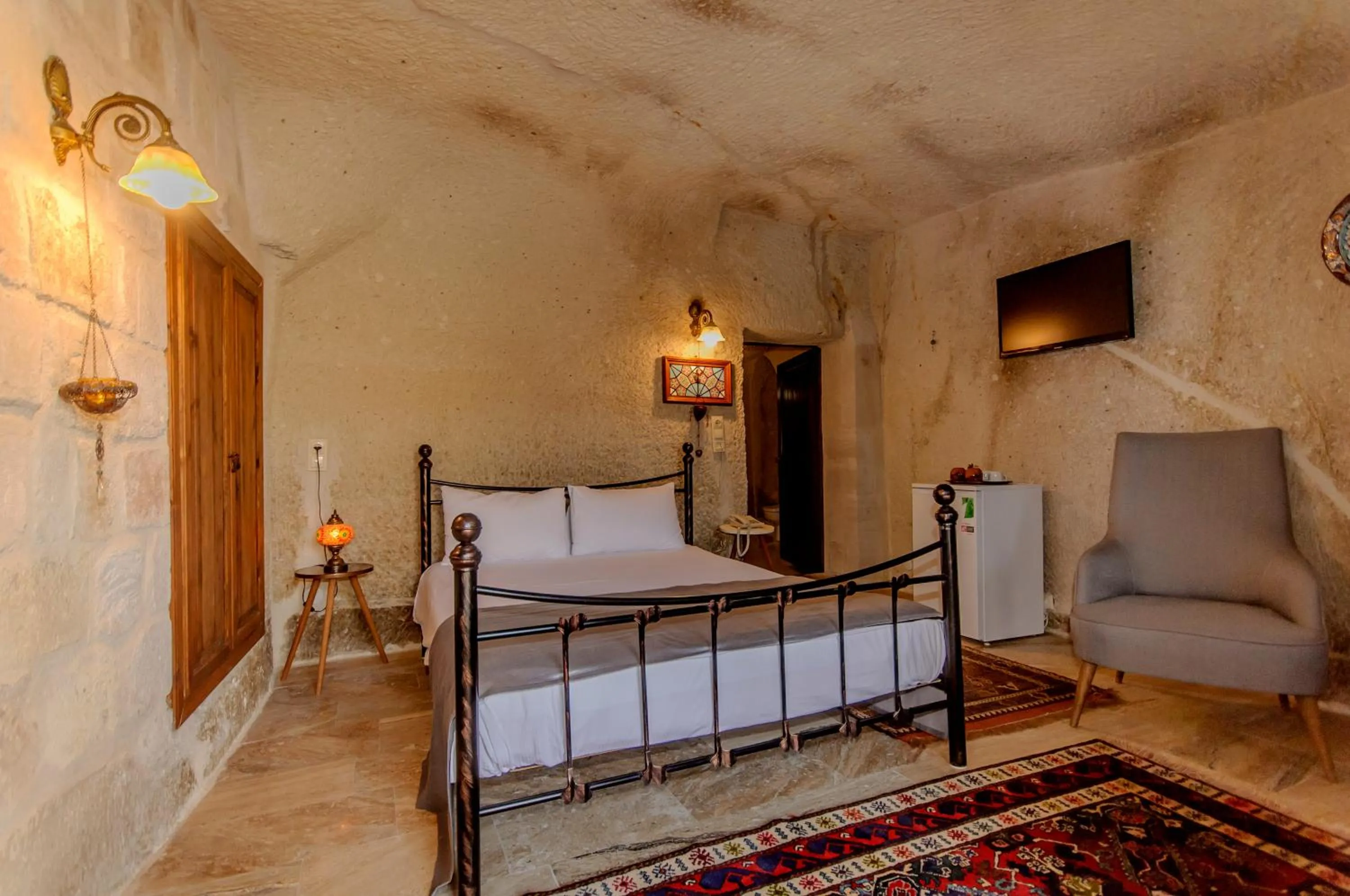 Bed in Nessa Cave Hotel