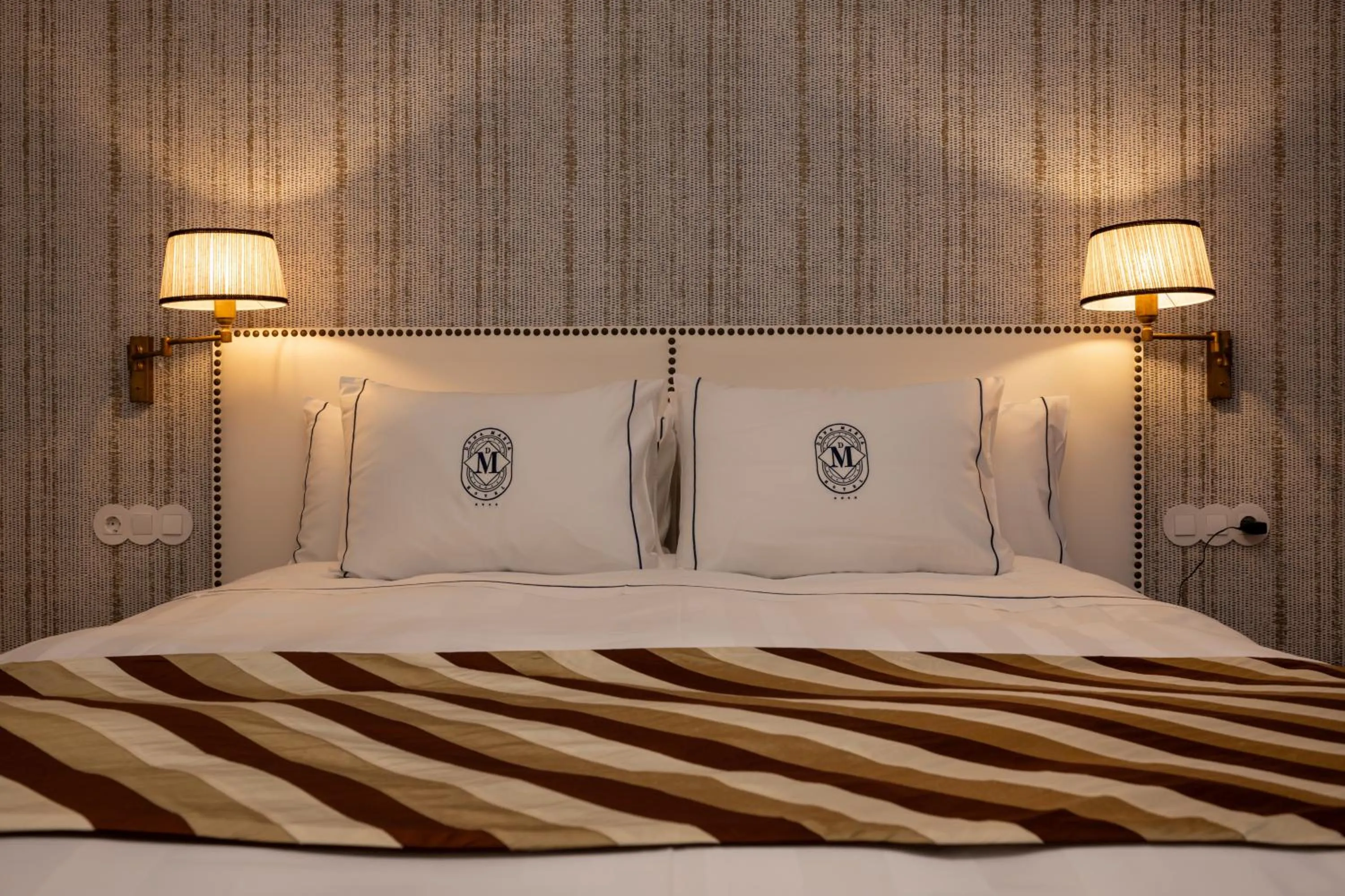 Bed in Dona Maria Hotel