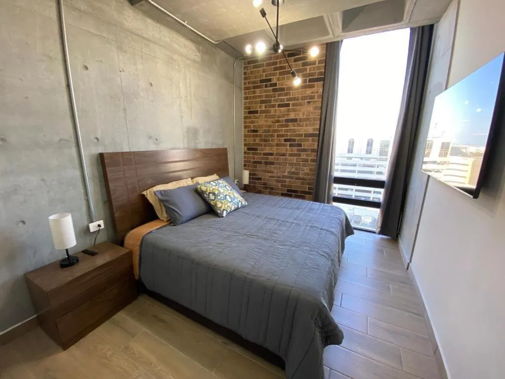 Bed in Lux 2 bedroom apartment, swimming pool, gym and free parking spot in Macro Plaza area