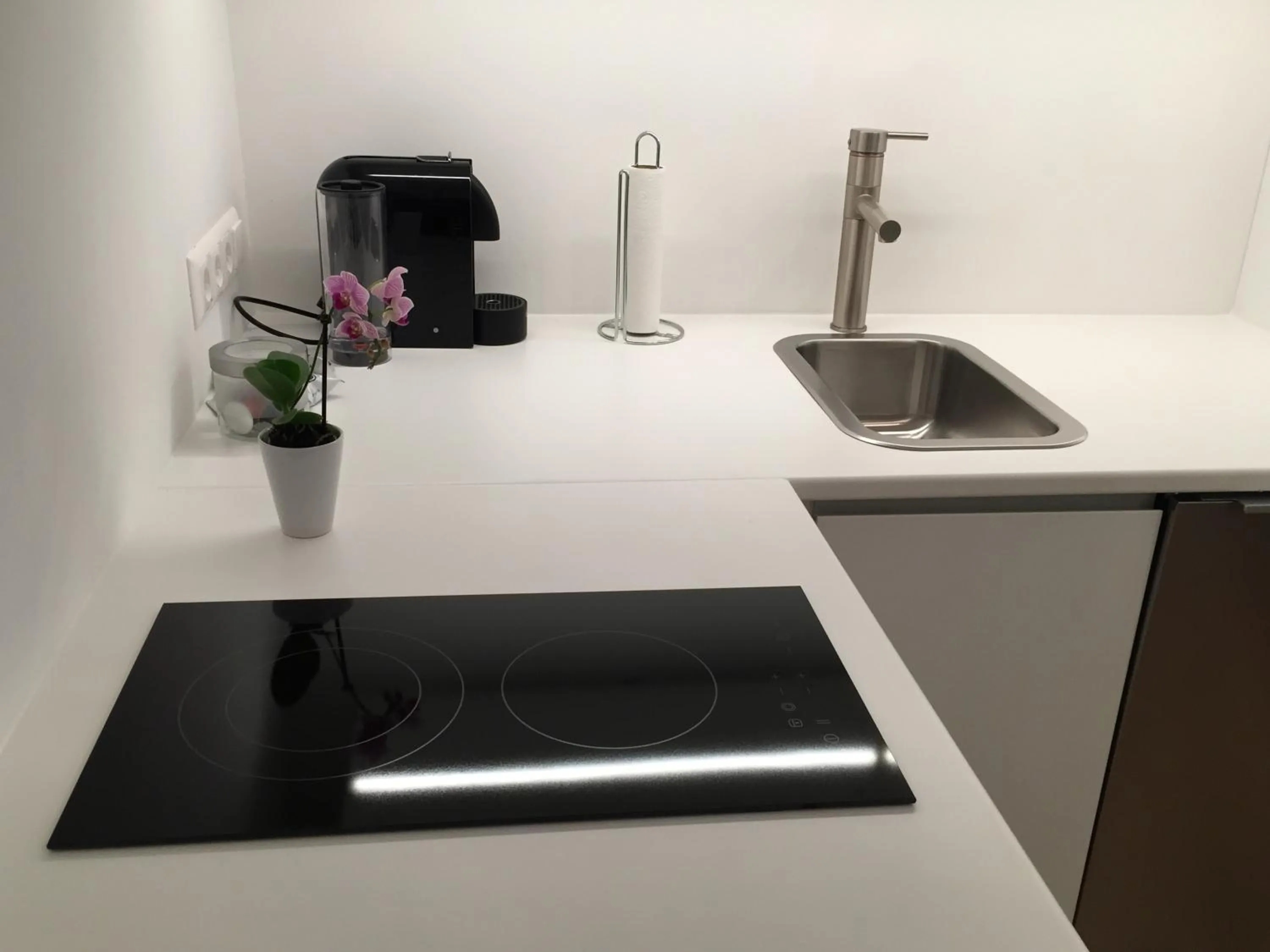 Kitchen or kitchenette in Pink Grapefruit City Condo