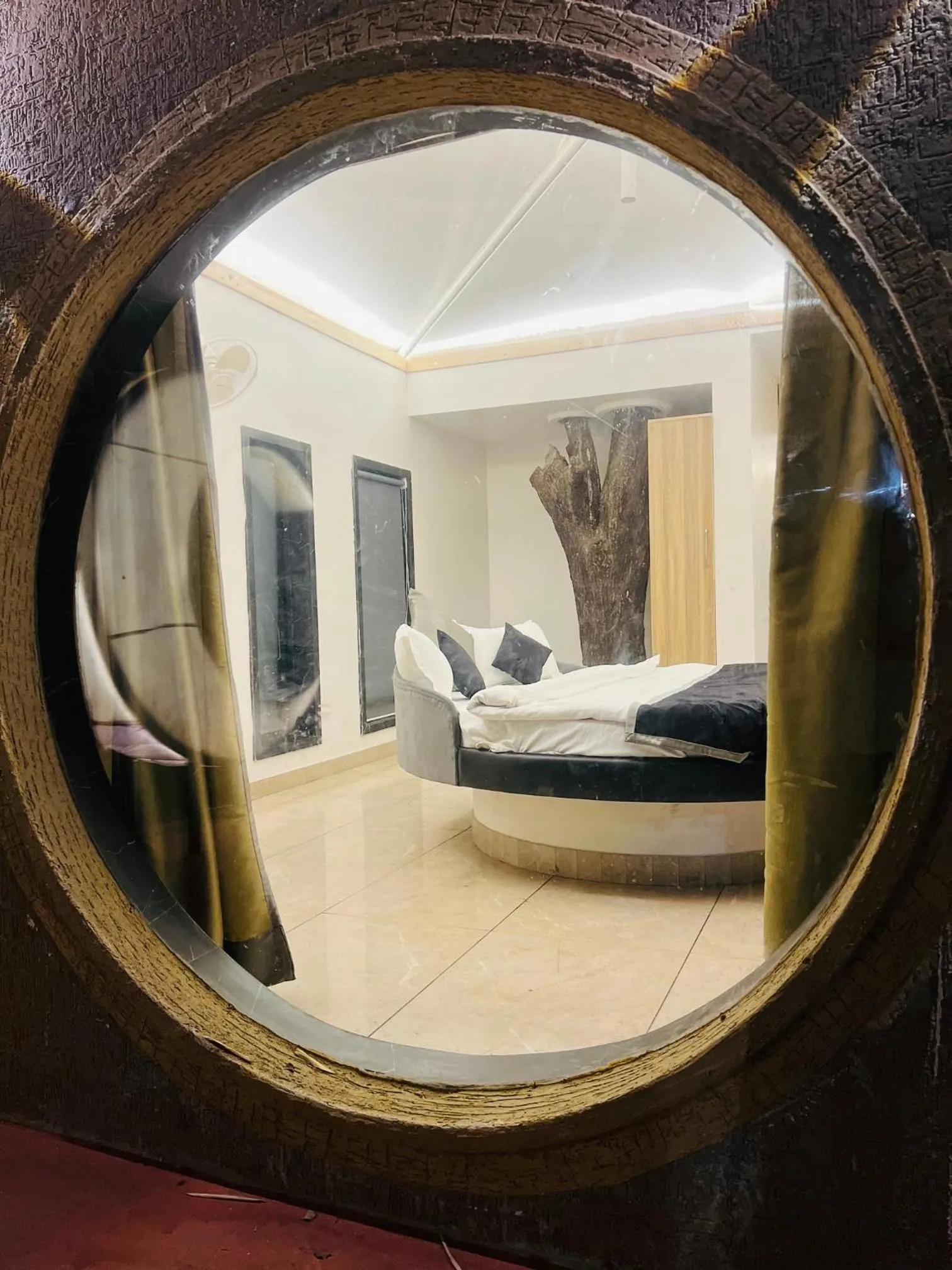 Bed in The Whispering Palms Resort