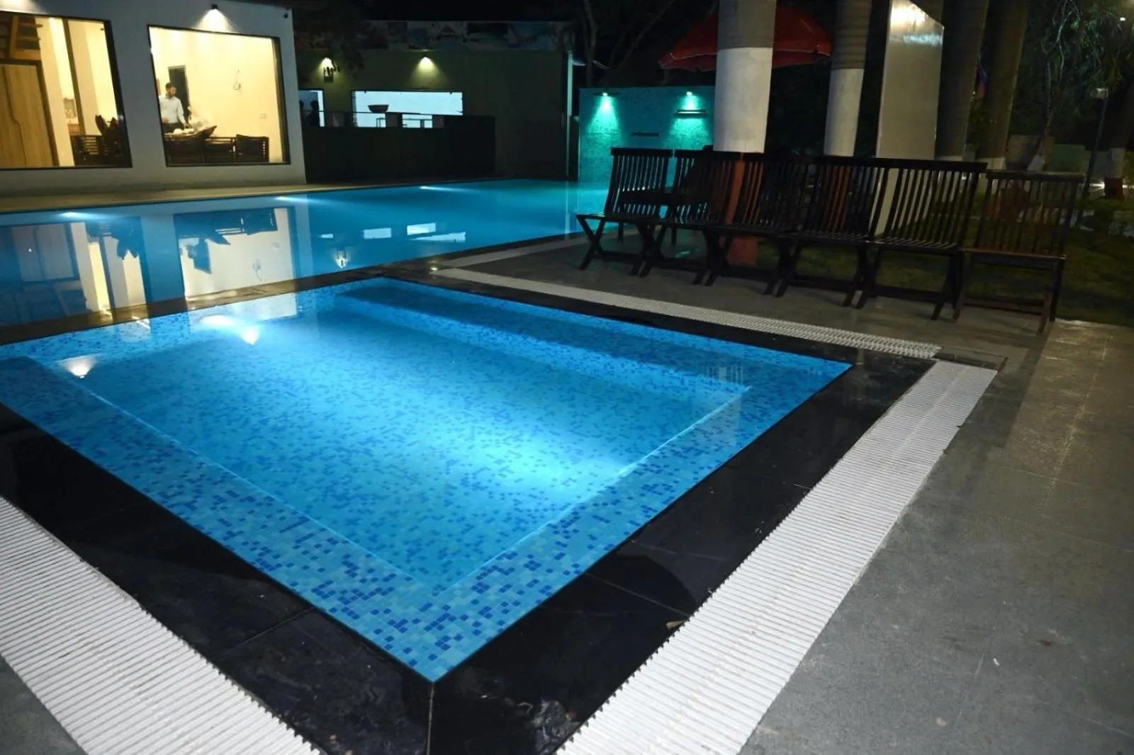 Swimming pool in The Whispering Palms Resort