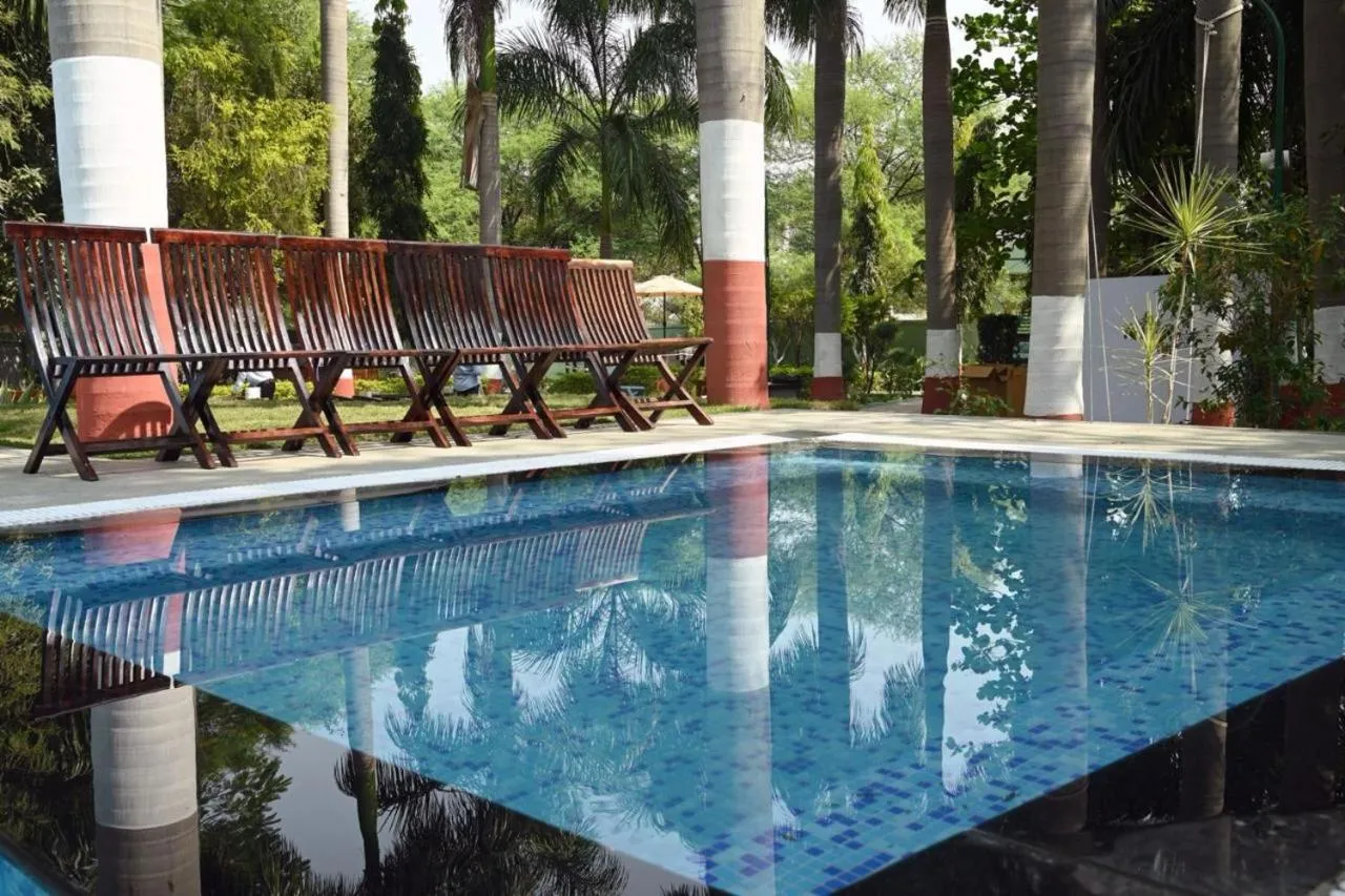 Swimming pool in The Whispering Palms Resort